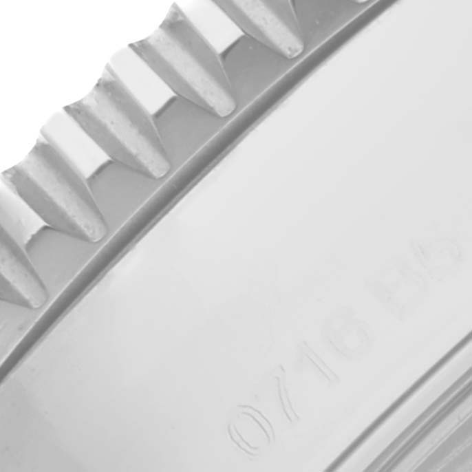 This close-up shows the bezel and part of the case back of the Breitling Superocean A17365 Men's Stainless Steel White Dial A17365 Men's Stainless Steel White Dial watch.