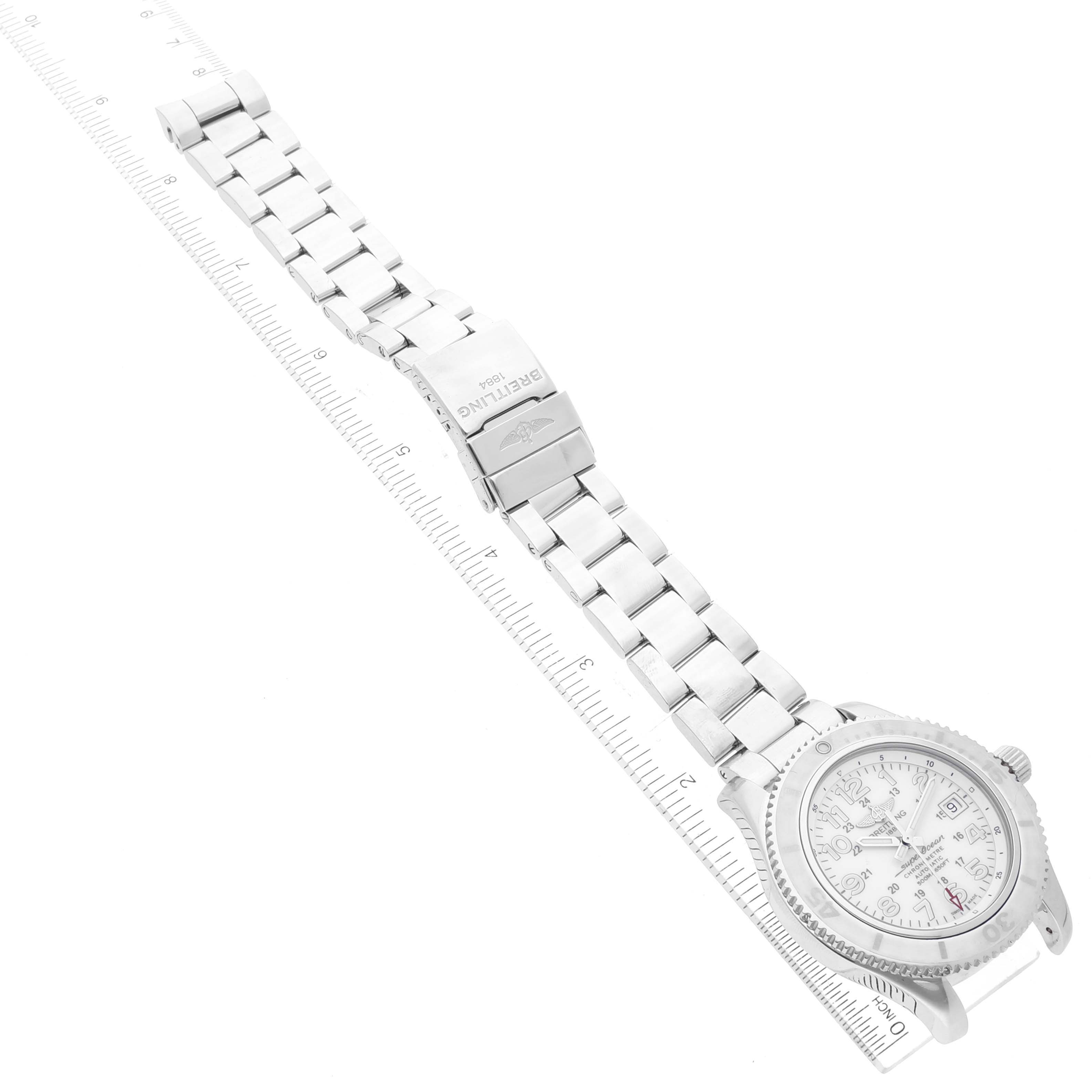 This image shows the Breitling Superocean A17365 Men's Stainless Steel White Dial A17365 Men's Stainless Steel White Dial watch from a top-down angle, highlighting the watch face, bezel, and metal bracelet with a clasp.