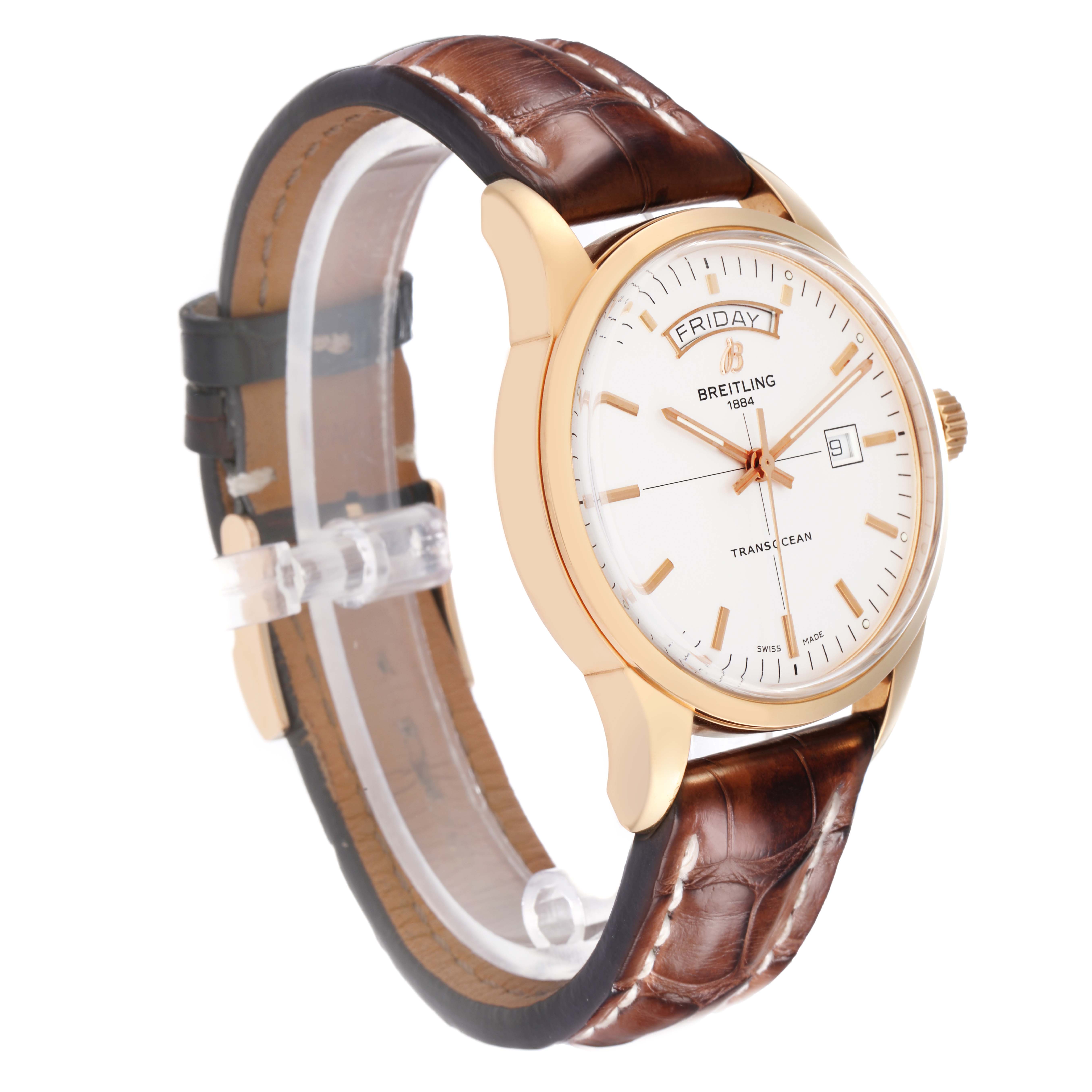 The Breitling Transocean R45310 Men
s Rose Gold Silver Dial watch is shown at a three-quarter angle, highlighting the face, case, leather strap, and crown.