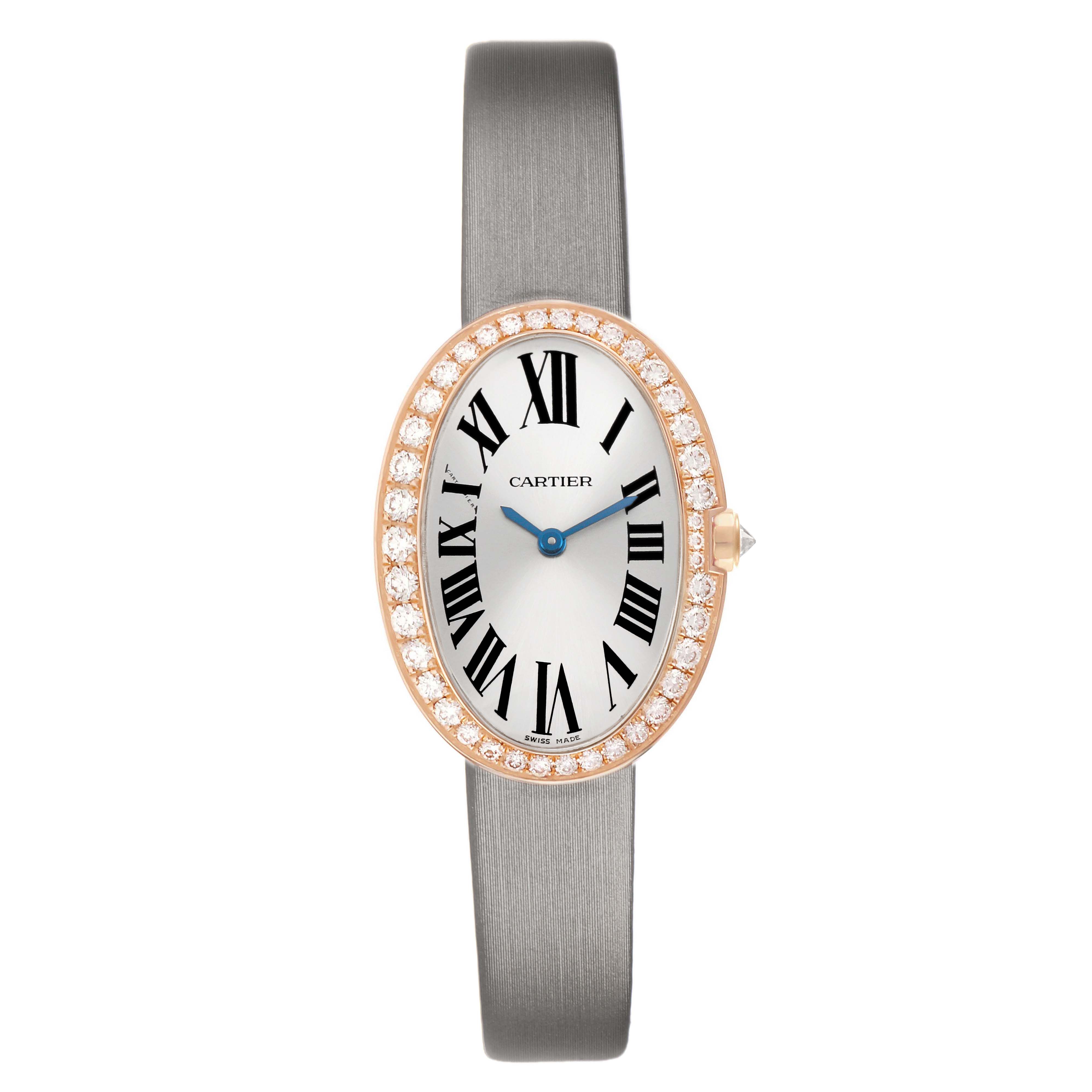 The Cartier Baignoire WB520004 Women's Rose Gold Silver Dial watch is shown from the front, displaying its oval face, diamond bezel, and elegant strap.