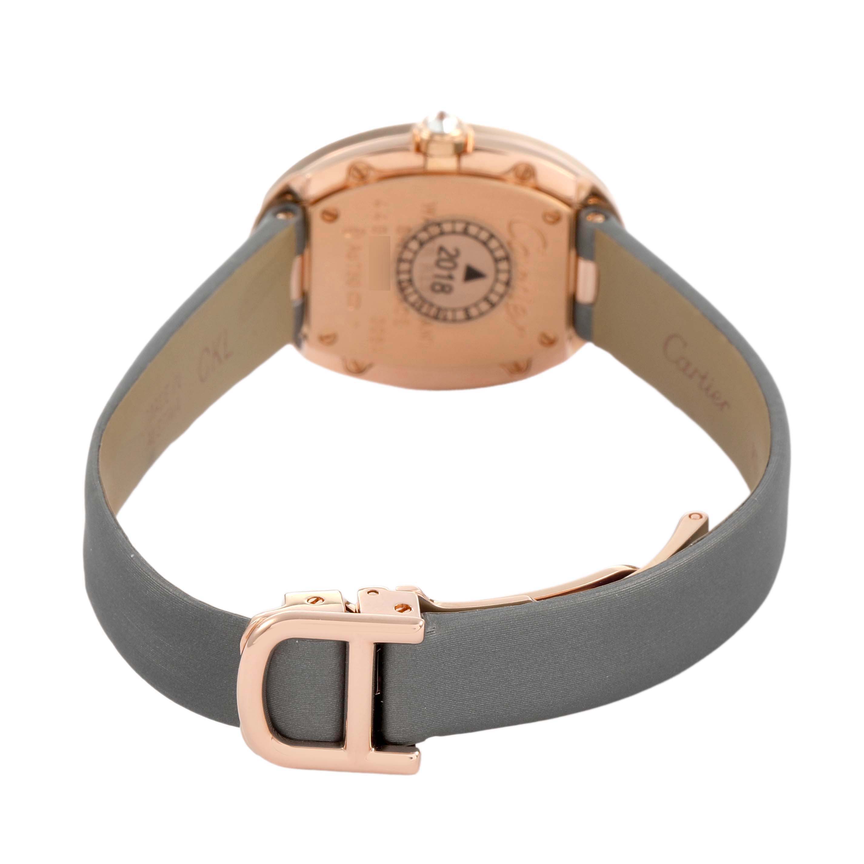 The image shows the back of a Cartier Baignoire WB520004 Women's Rose Gold Silver Dial watch, displaying the strap and case back with a focus on the clasp and branding.