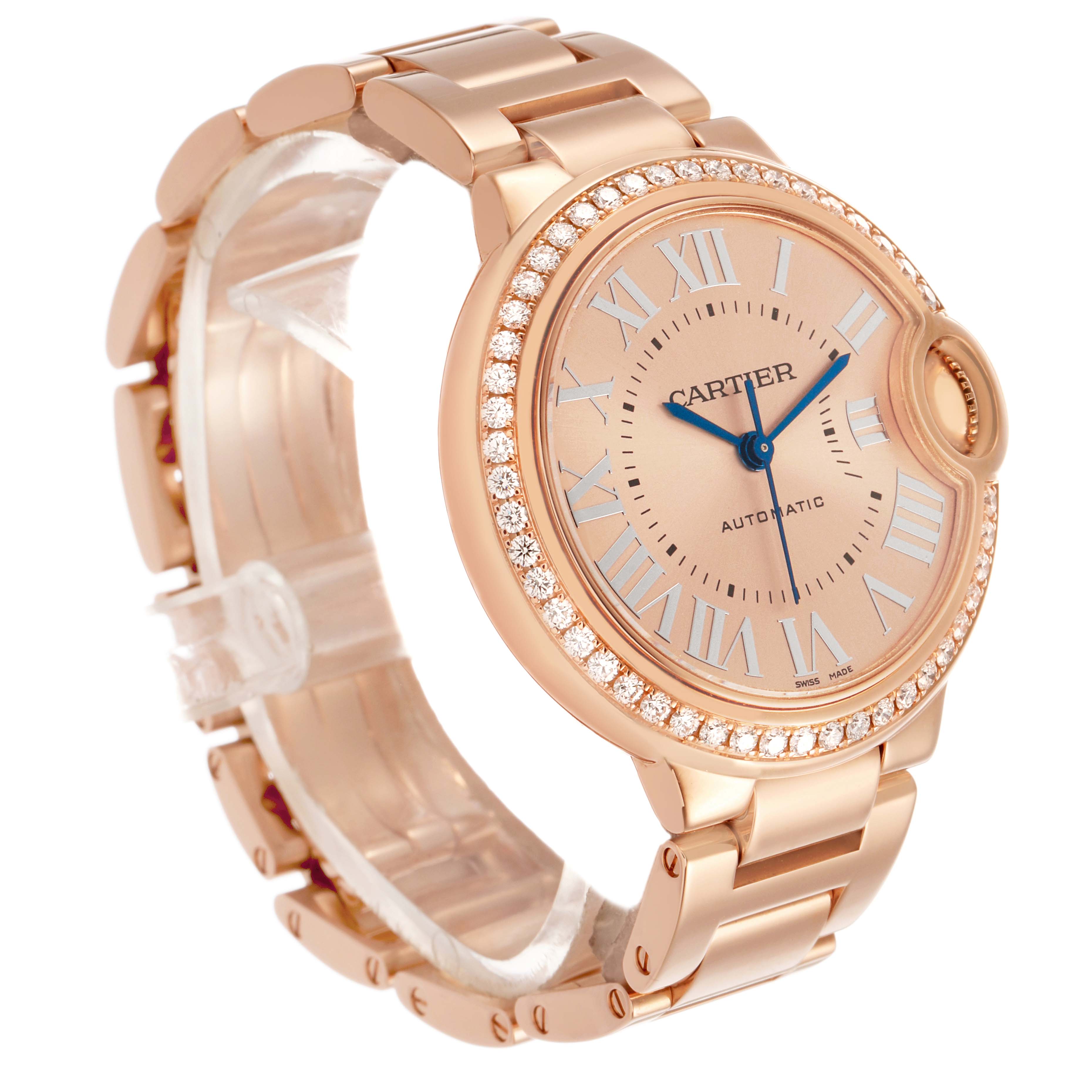 The Cartier Ballon Bleu WJBB0077 Women's Yellow Gold Pink Dial watch is shown at a three-quarter angle, highlighting the face, bezels, and part of the bracelet.