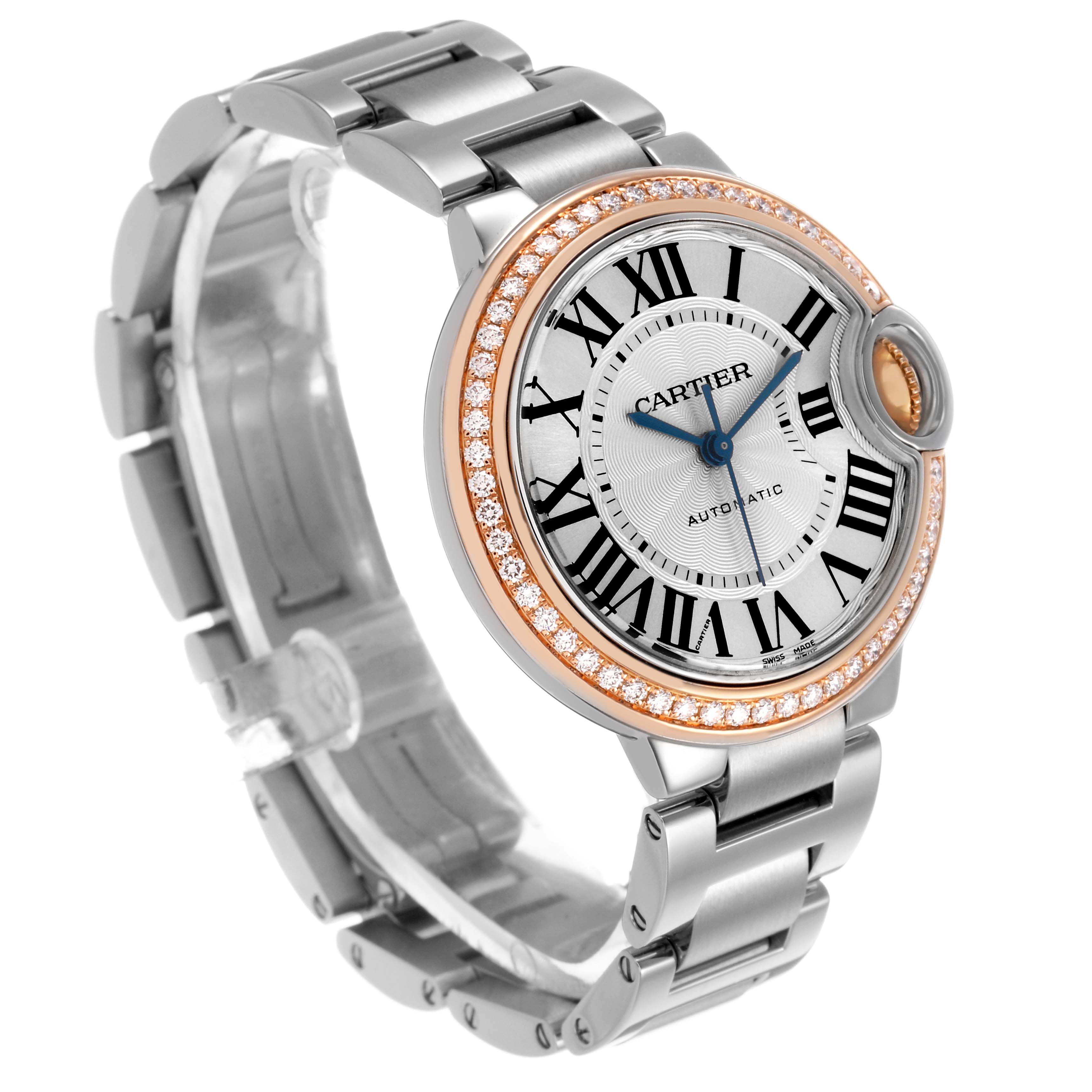 The Cartier Ballon Bleu WE902080 Women's Steel and Gold (two tone) Silver Dial watch is shown at a three-quarters angle, highlighting the face, bracelet, and diamond-encrusted bezel.