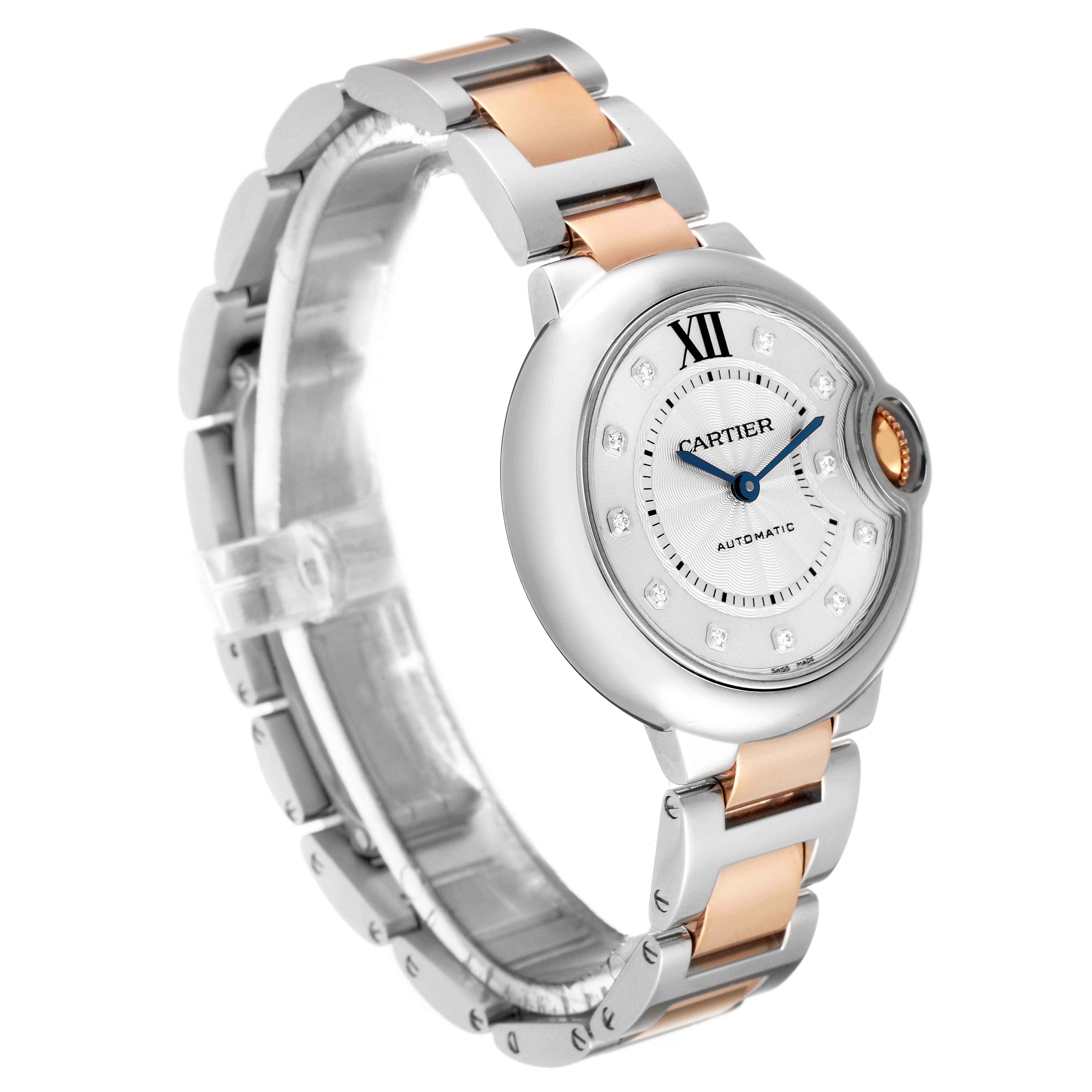 The image shows a Cartier Ballon Bleu WE902061 Women
s Stainless Steel Silver Dial WE902061 Women
s Stainless Steel Silver Dial watch at a slight angle, highlighting its face, bezel, and two-tone bracelet.