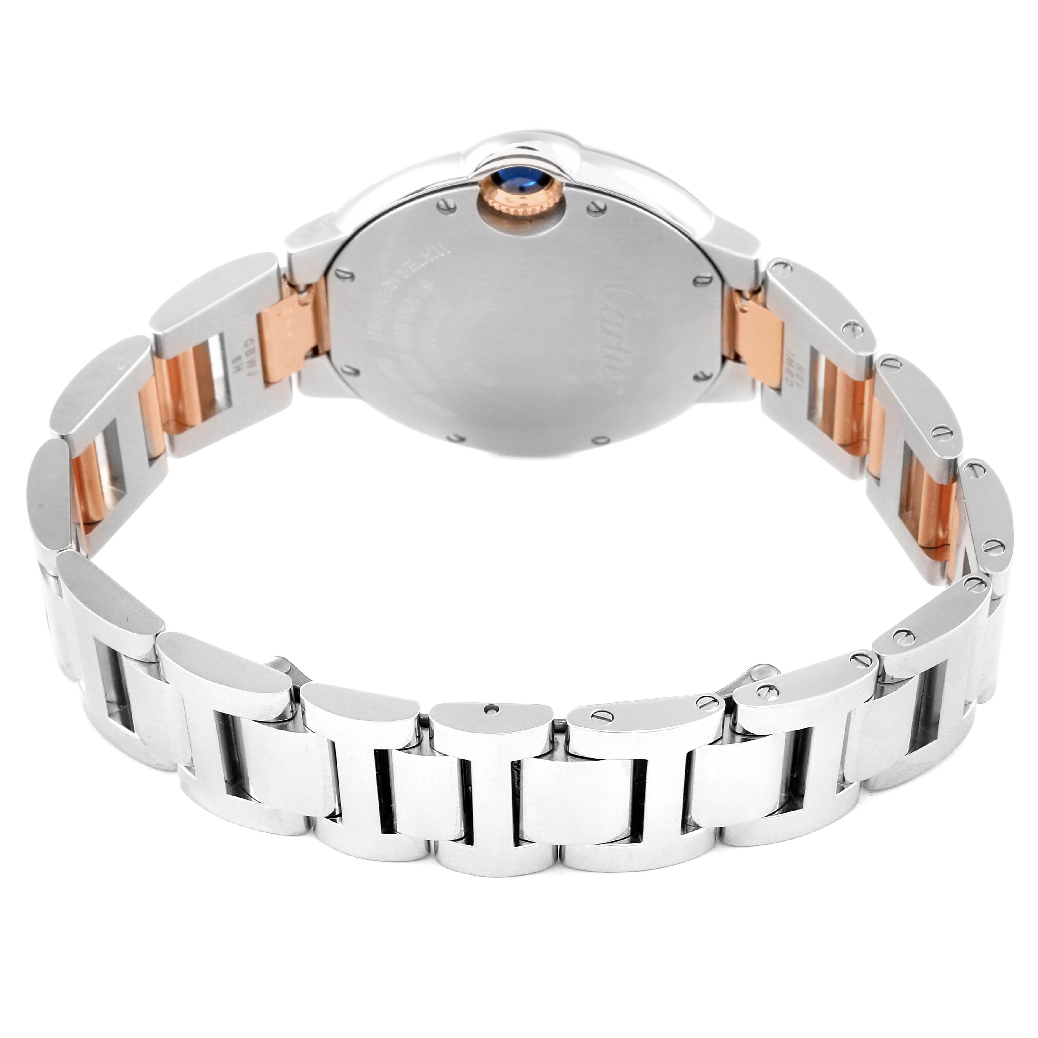 The image shows the back and bracelet of a Cartier Ballon Bleu WE902061 Women
s Stainless Steel Silver Dial WE902061 Women
s Stainless Steel Silver Dial watch, highlighting its case back, link bracelet, and crown.