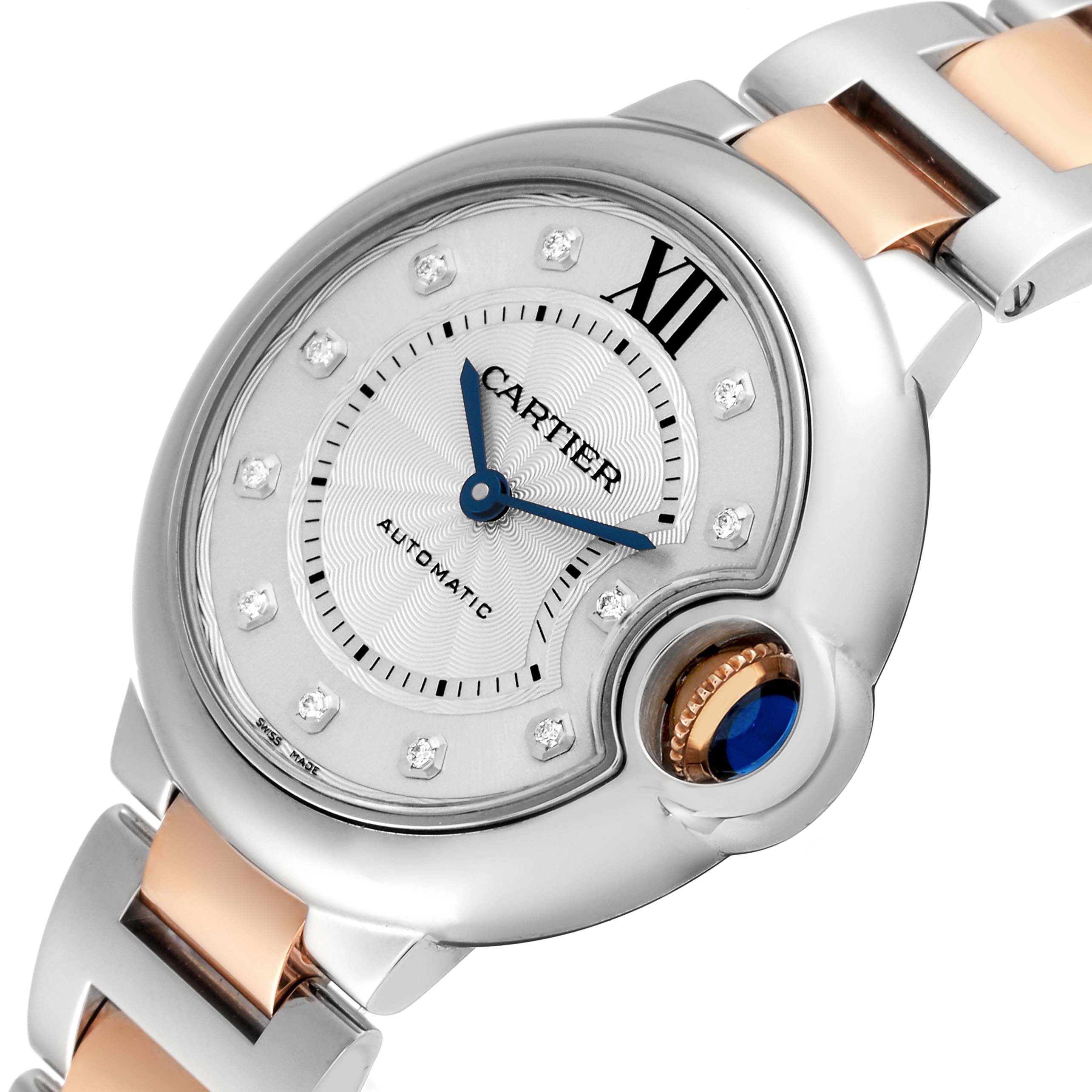 This is a close-up angled view of the Cartier Ballon Bleu WE902061 Women
s Stainless Steel Silver Dial WE902061 Women
s Stainless Steel Silver Dial, showing the dial, hands, diamond markers, and part of the bracelet.