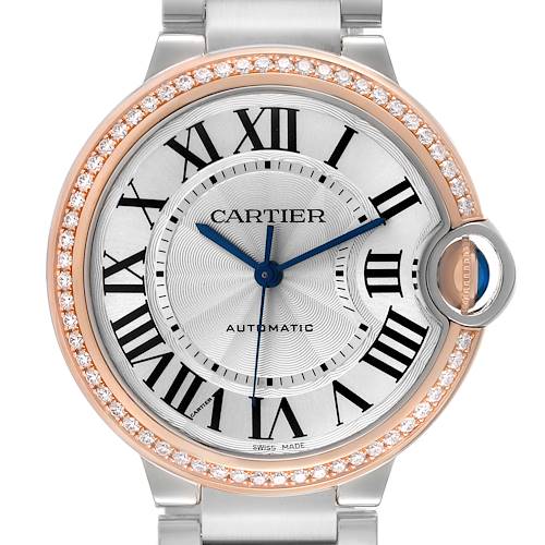 The Cartier Ballon Bleu WE902081 Women's Stainless Steel Silver Dial watch is shown from the front, displaying its diamond-encrusted bezel, Roman numerals, and blue hands.