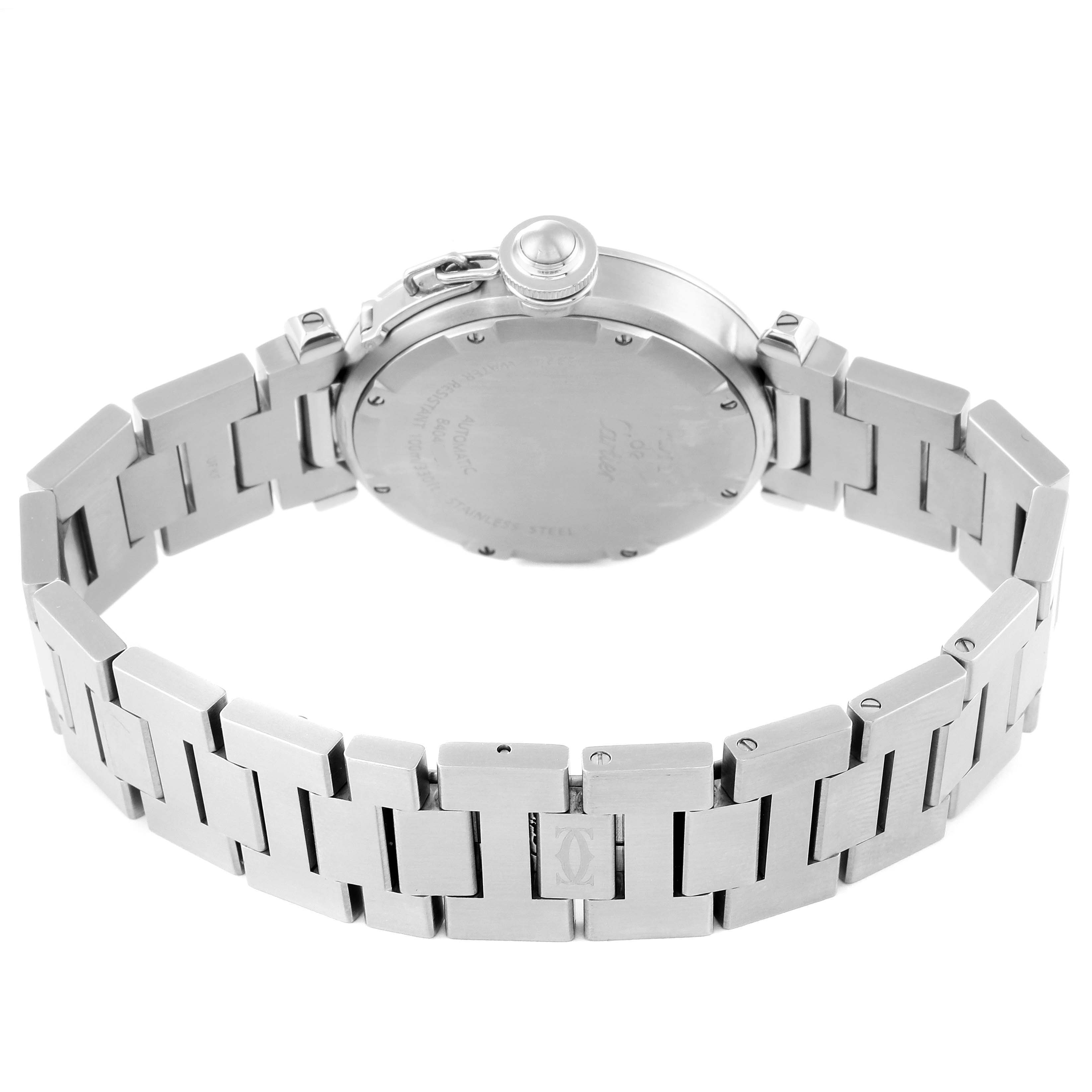 The image shows the back case and bracelet of a Cartier Pasha W31076M7 Women's Stainless Steel Black Dial W31076M7 Women's Stainless Steel Black Dial watch from an overhead angle.