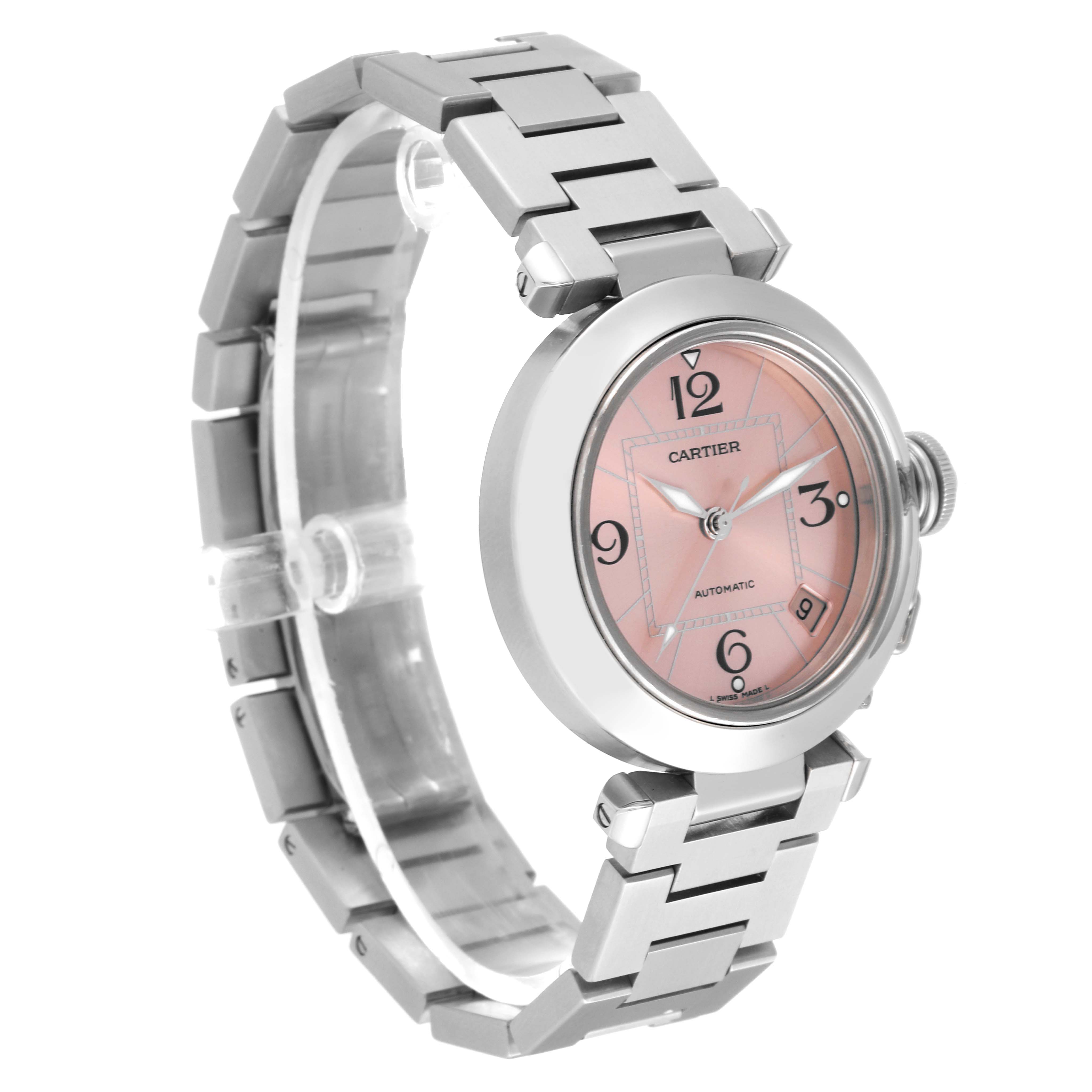 This image shows a Cartier Pasha W31075M7 Women's Stainless Steel Pink Dial W31075M7 Women's Stainless Steel Pink Dial watch at a three-quarter angle, highlighting its face, bezel, and metal bracelet.