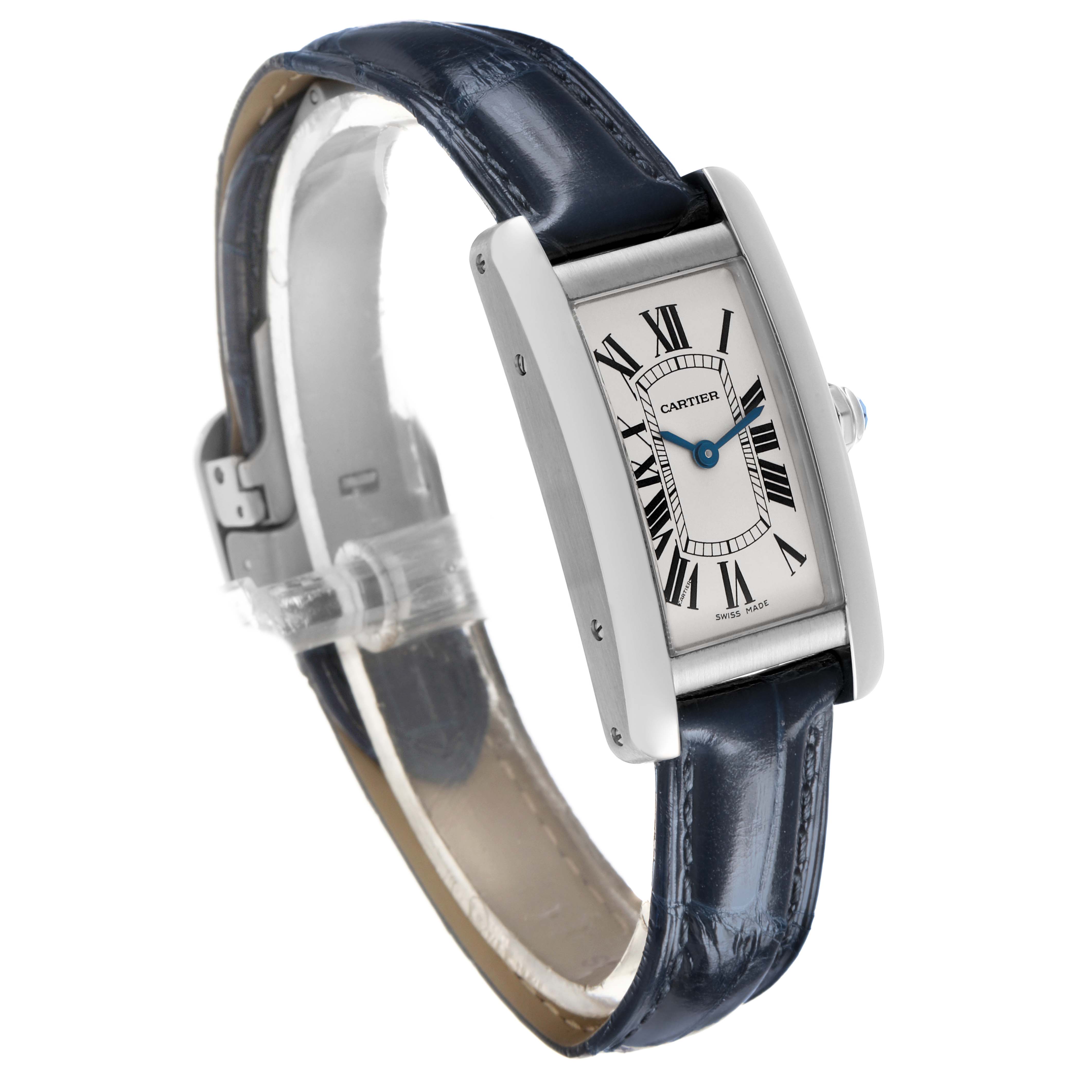 The Cartier Tank Américaine watch is shown at a three-quarter angle, highlighting its face, leather strap, and side profile.