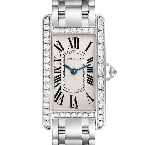 The Cartier Tank Americaine watch is shown from the front, displaying its rectangular face, Roman numerals, and diamond-studded bezel.