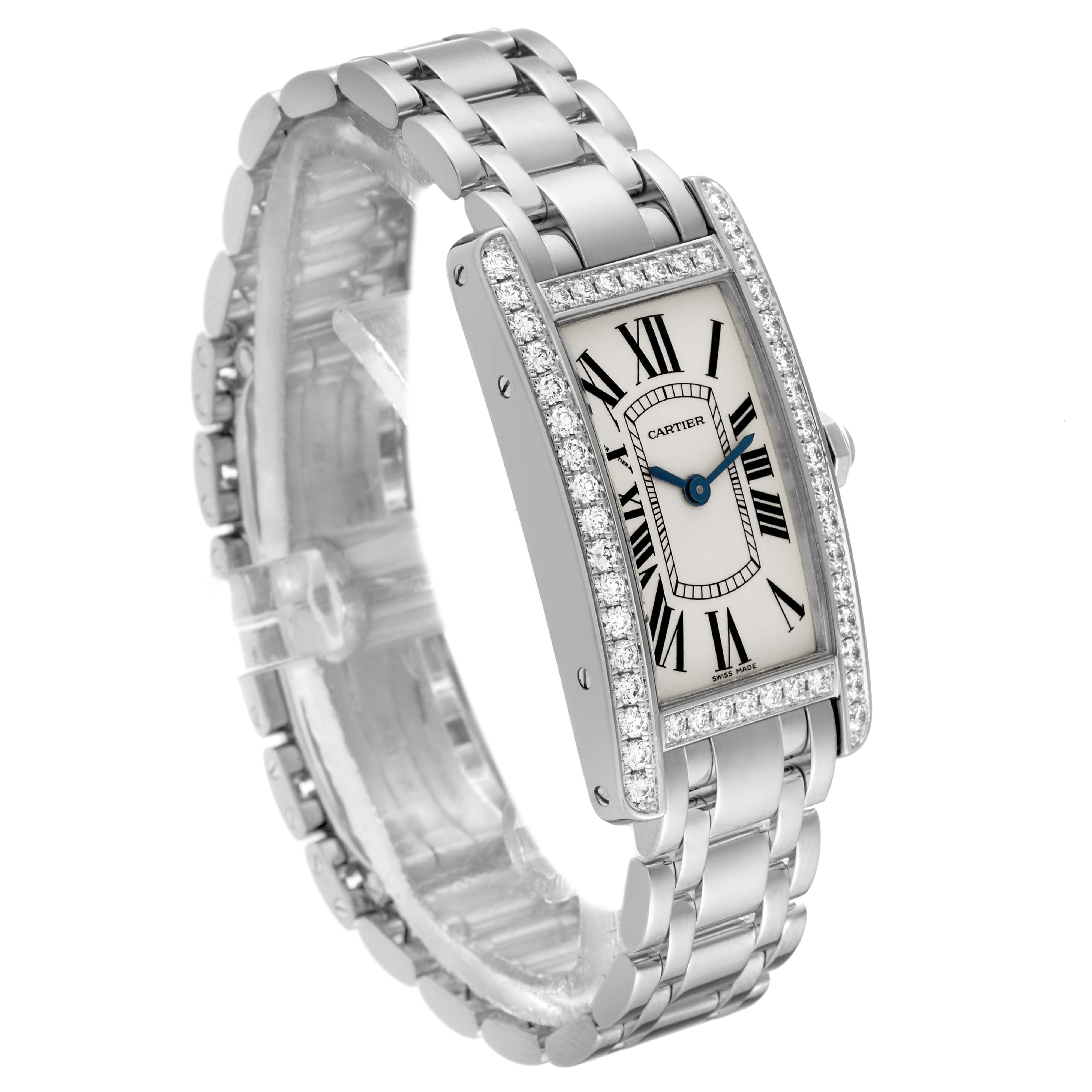 The image shows a Cartier Tank Americaine WB7073L1 Women's Stainless Steel Silver Dial WB7073L1 Women's Stainless Steel Silver Dial watch from a 3/4 angle, highlighting its rectangular case, bracelet, and diamond accents.