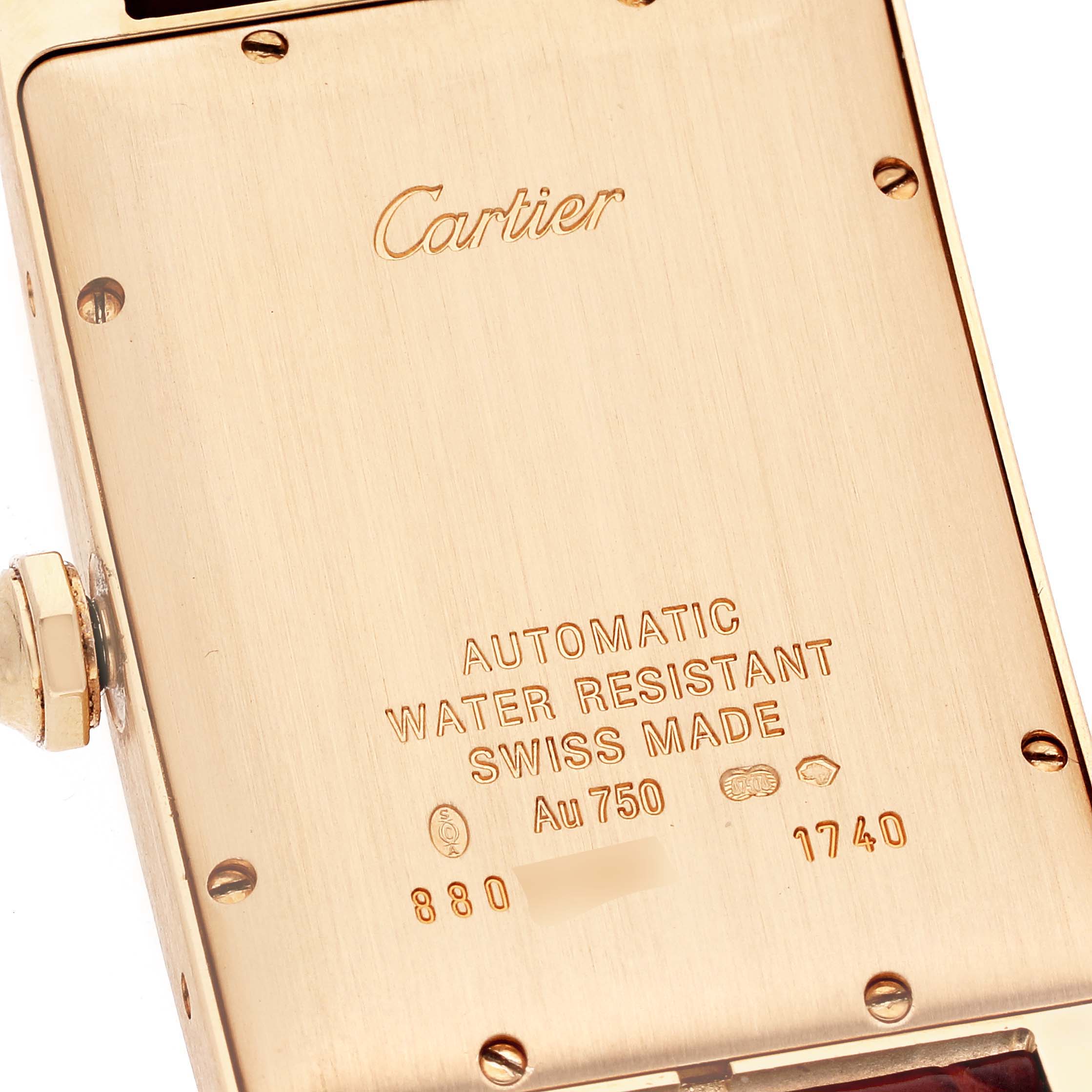 This image shows the case back of a Cartier Tank Américaine watch, displaying engravings about its specifications.