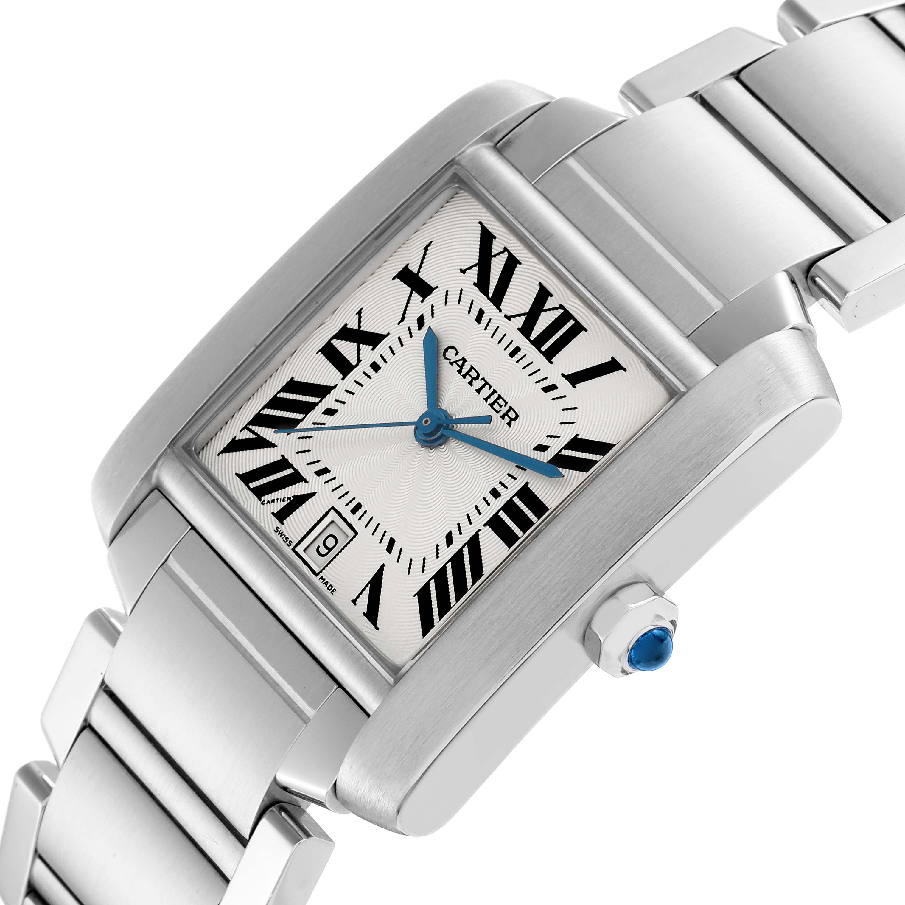 The Cartier Tank Française watch is shown at an angled close-up, highlighting the dial, Roman numerals, and metal bracelet.