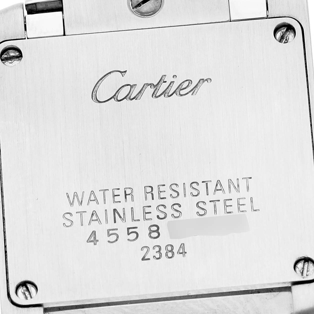 The image shows the back cover of a Cartier Tank Francaise W51008Q3 Women's Stainless Steel Silver Dial W51008Q3 Women's Stainless Steel Silver Dial watch, displaying the brand name and model information.