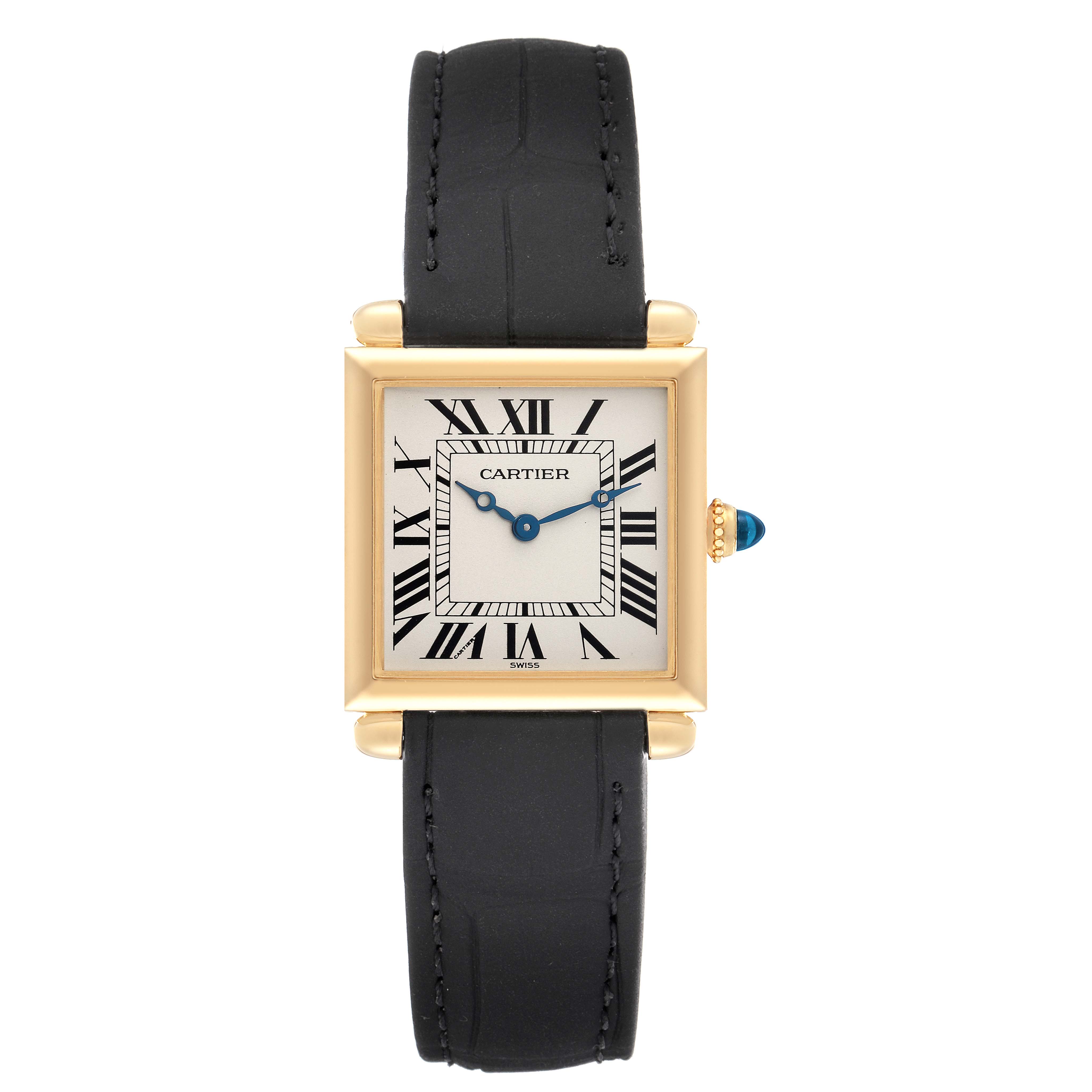 The Cartier Tank Obus W1512256 Women
s Yellow Gold Silver Dial watch is shown from a top-down angle, highlighting the square dial, Roman numerals, and black strap.