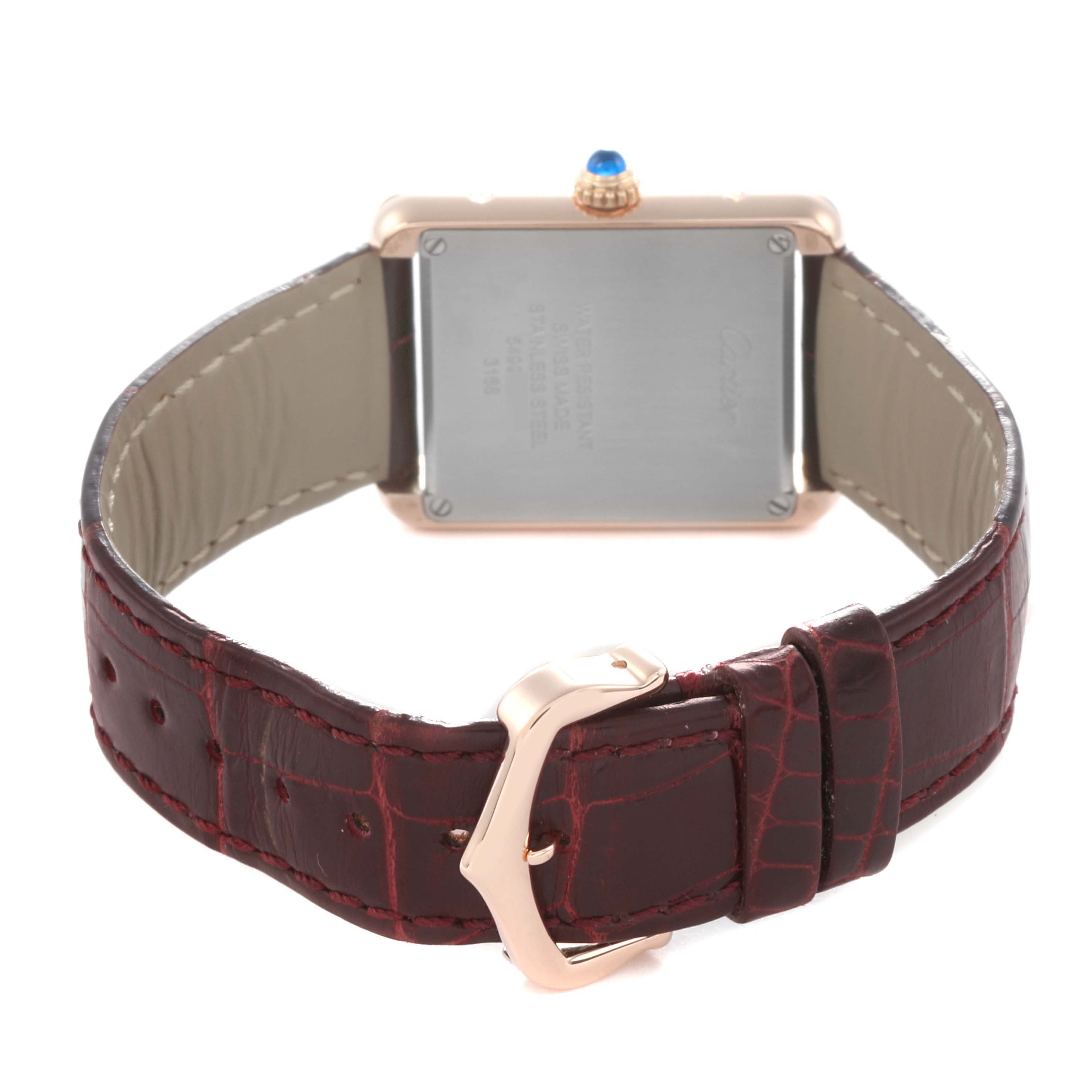 The image shows the back and strap of a Cartier Tank Solo W5200024 Women
s Rose Gold Silver Dial watch, featuring the case back and leather buckle.