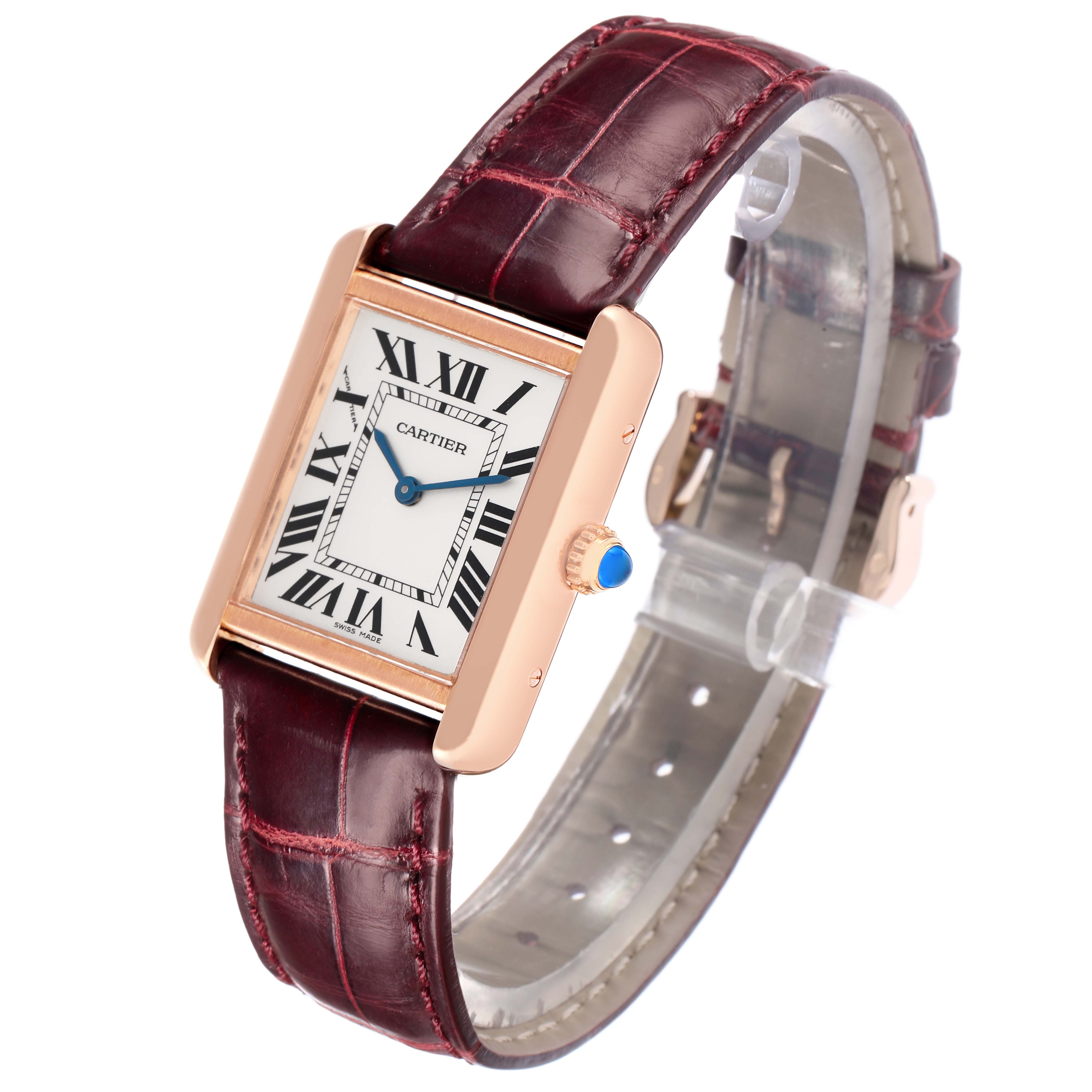 The Cartier Tank Solo W5200024 Women
s Rose Gold Silver Dial watch is shown at an angle highlighting its rectangular face, Roman numerals, and brown leather strap.