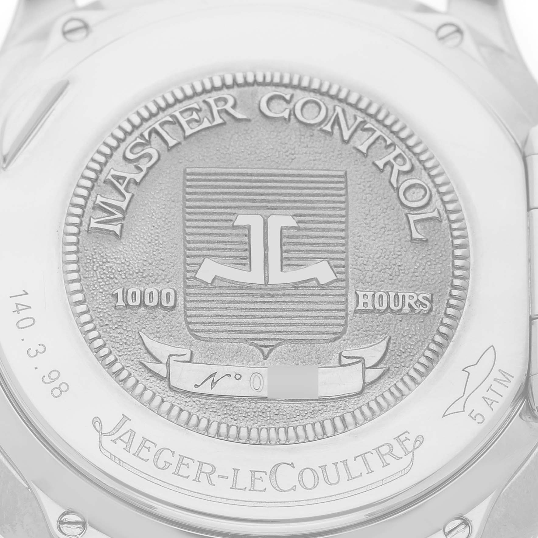 The image shows the engraved case back of a Jaeger-LeCoultre Master Control watch, displaying its branding and certification details.