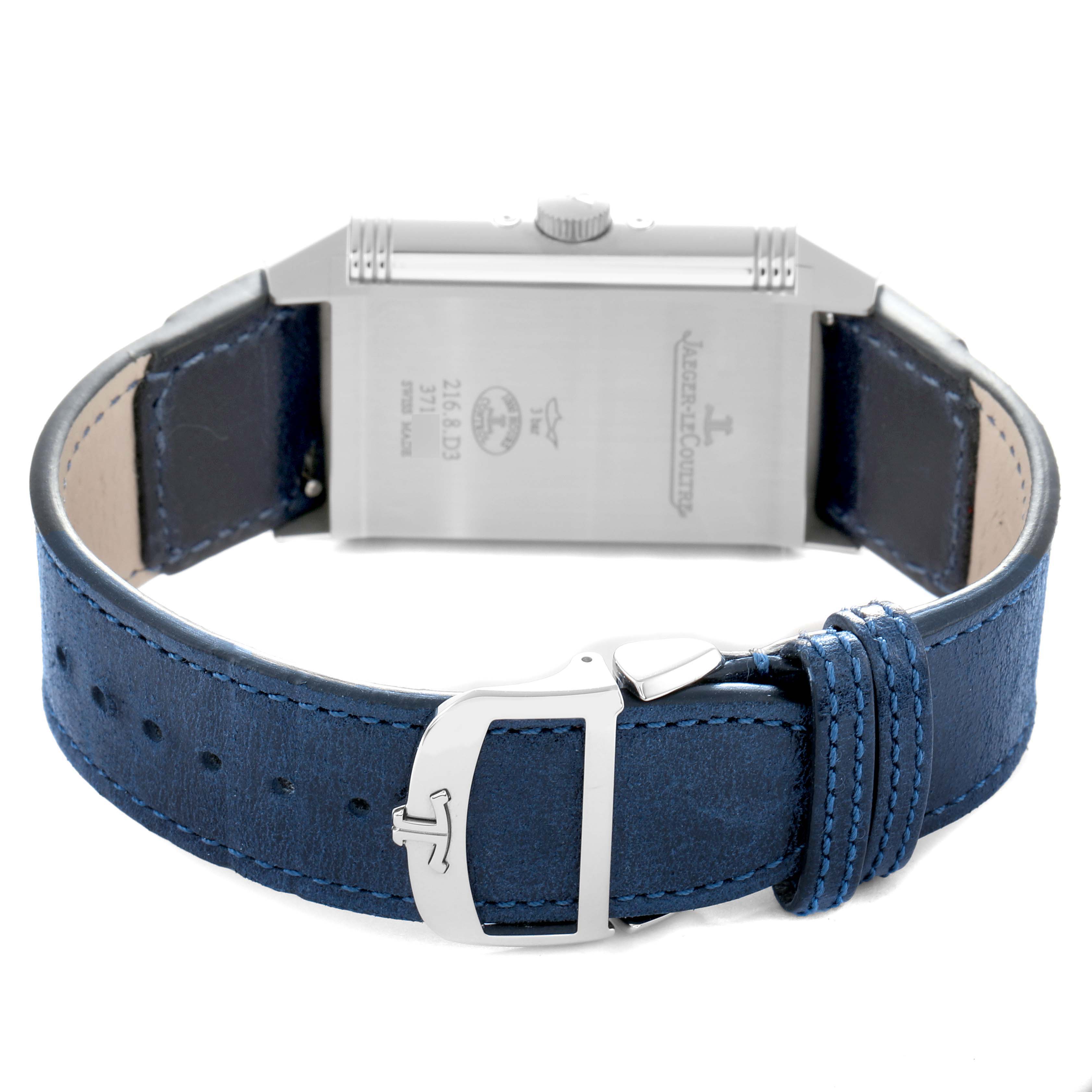 The image shows the back view of a Jaeger-LeCoultre Reverso watch, focusing on the caseback, strap, and buckle.