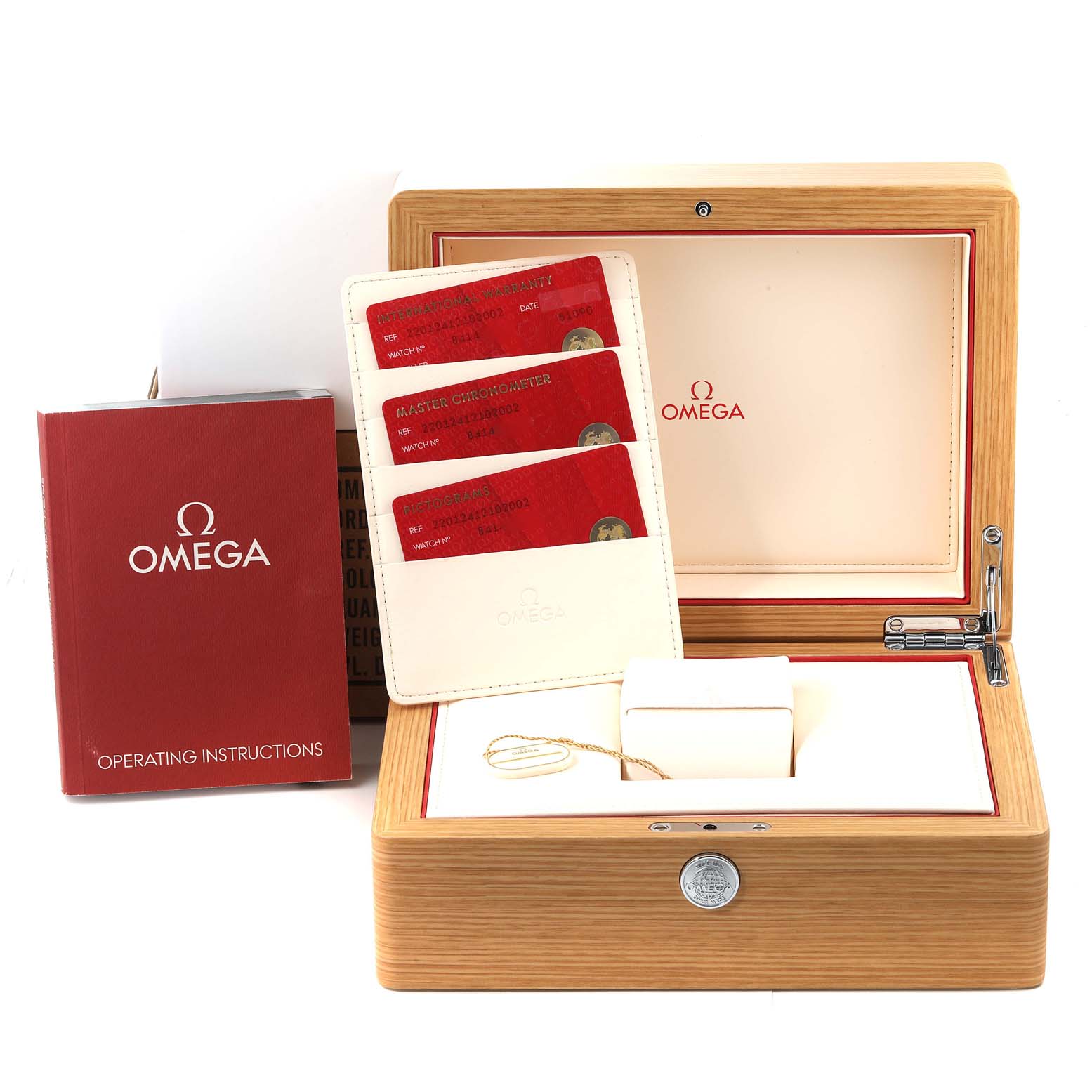 The image shows the Omega Aqua Terra 220.12.41.21.02.002 Men
s Stainless Steel Silver Dial 220.12.41.21.02.002 Men
s Stainless Steel Silver Dial watch packaging, including the operating instructions, warranty cards, and a wooden box.