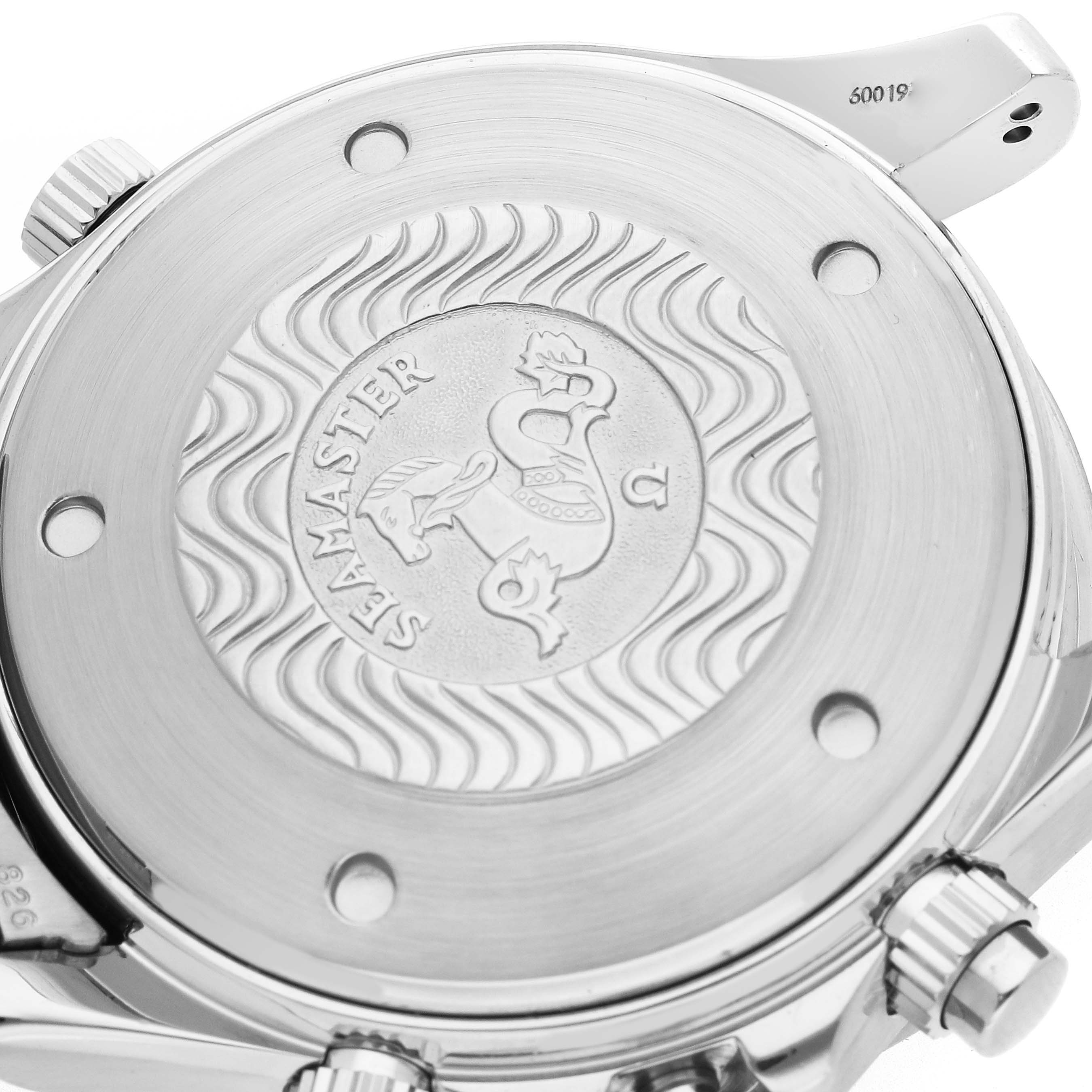 The image shows the case back of an Omega Seamaster 2599.80.00 Men
s Stainless Steel Blue Dial watch, featuring engravings and wave patterns.