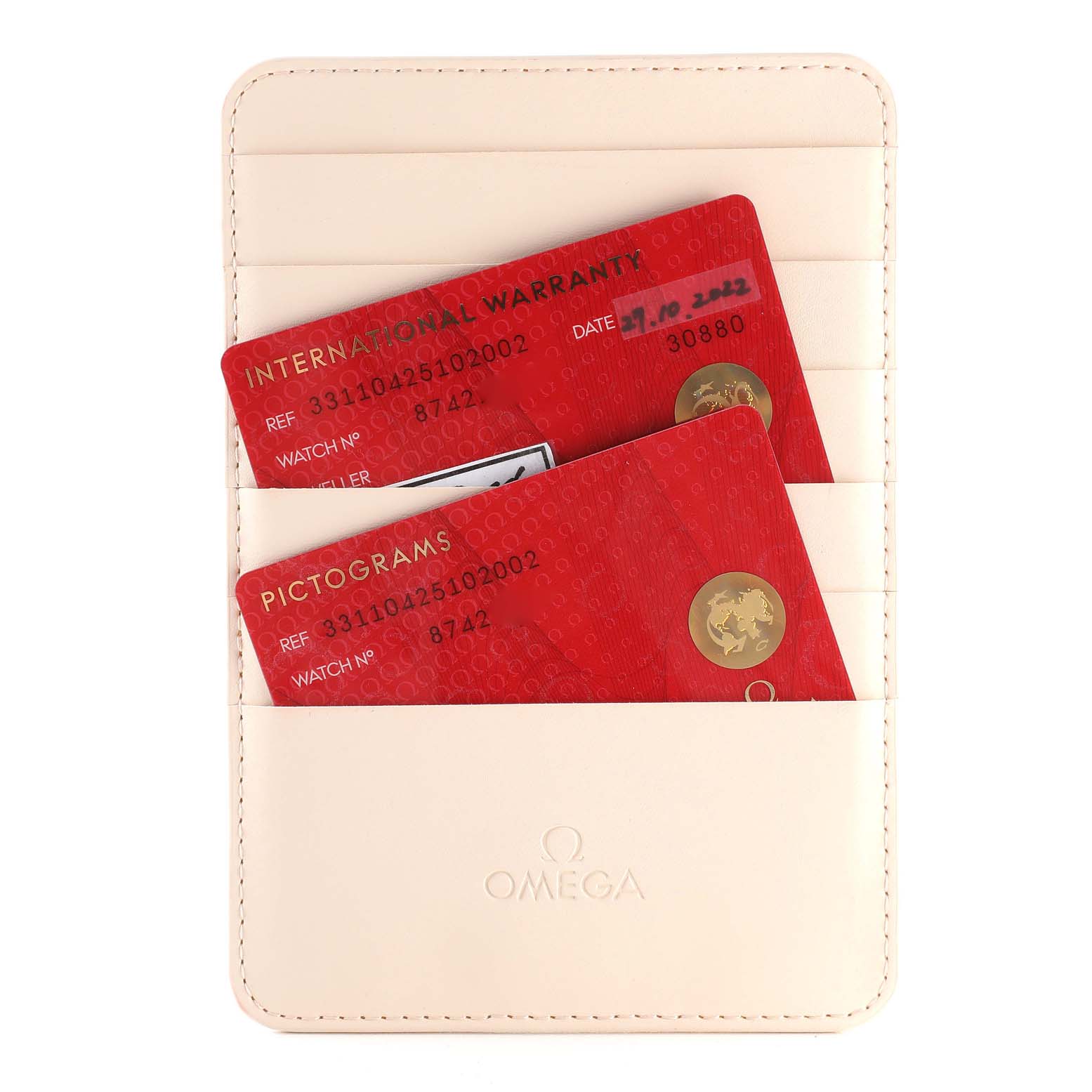 The image shows the warranty and pictograms cards for the Omega Speedmaster 331.10.42.51.02.002 Men
s Stainless Steel Silver Dial 331.10.42.51.02.002 Men
s Stainless Steel Silver Dial watch in a beige cardholder.