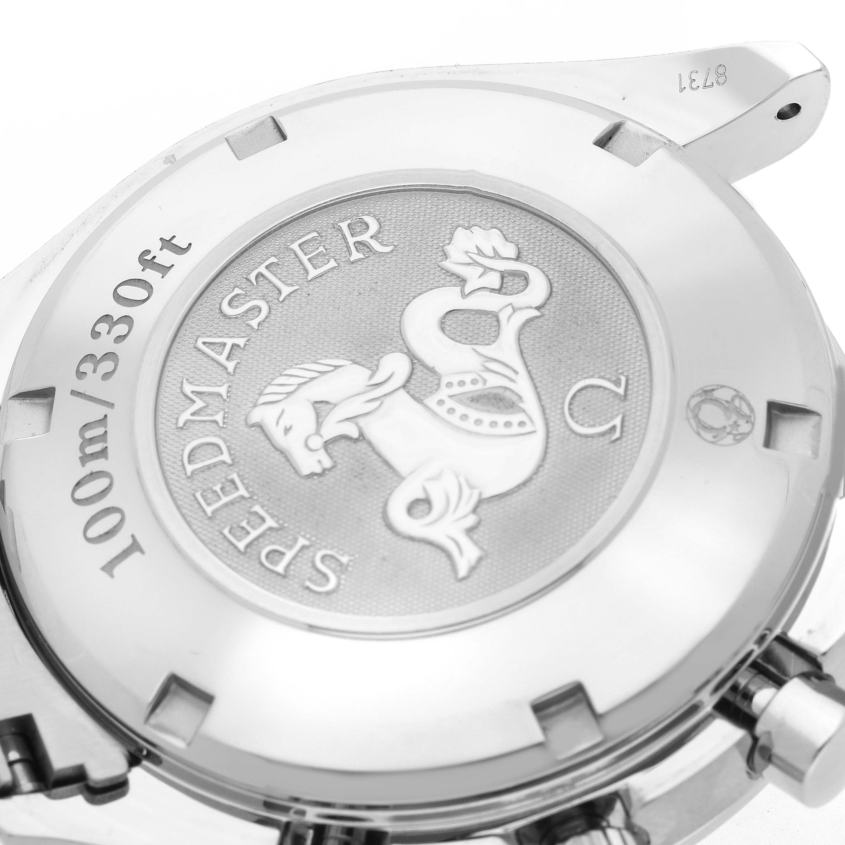 The image shows the case back of the Omega Speedmaster 323.30.40.40.06.001 Men
s Stainless Steel Grey Dial, featuring its engraved emblem and water resistance details.