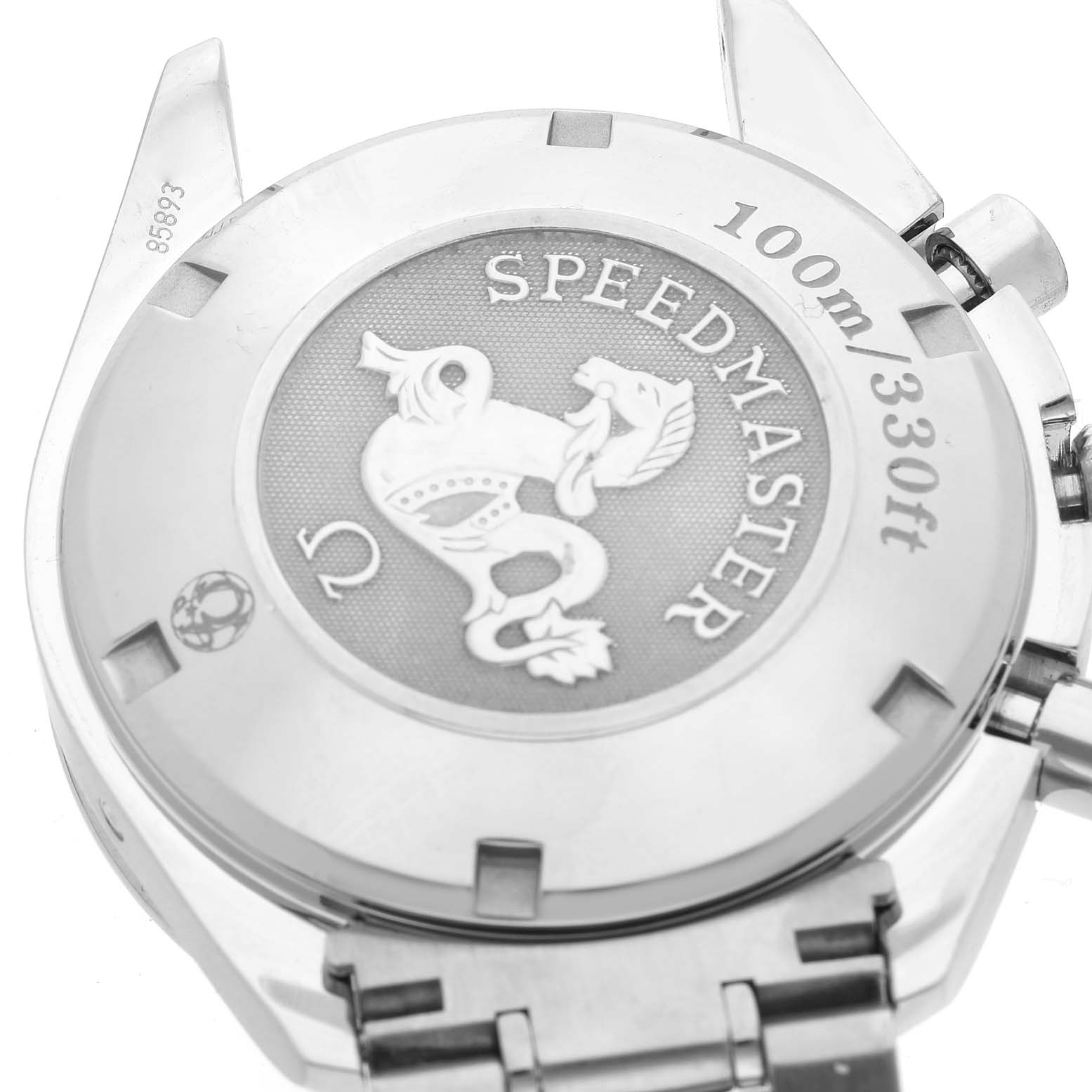 This image shows the case back of an Omega Speedmaster 3220.50.00 Men
s Stainless Steel Black Dial 3220.50.00 Men
s Stainless Steel Black Dial watch from a rear angle, highlighting its depth rating and engravings.