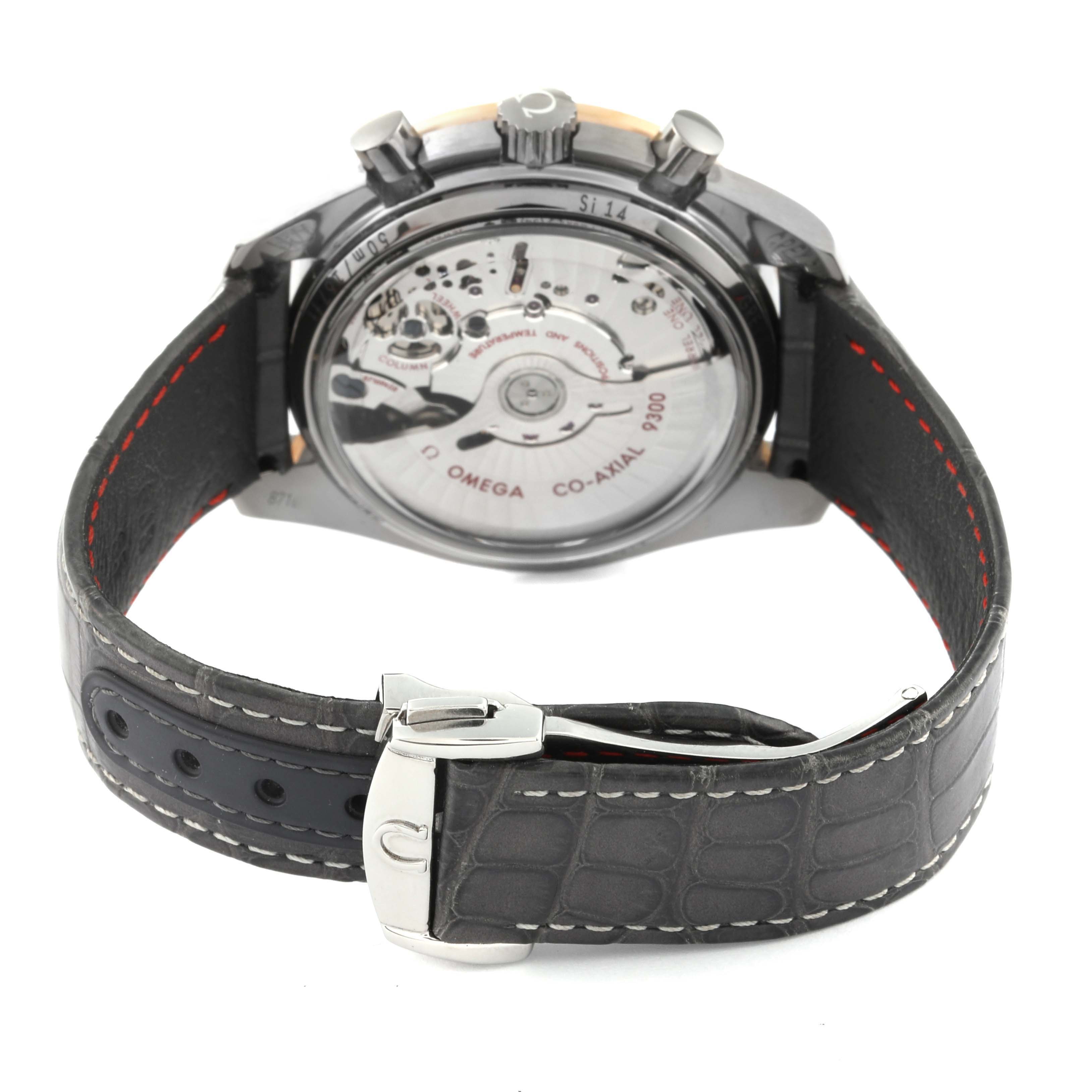 The image shows the back view of an Omega Speedmaster 311.63.44.51.99.001 Men's Ceramic Grey Dial 311.63.44.51.99.001 Men's Ceramic Grey Dial watch, highlighting its movement and leather strap.