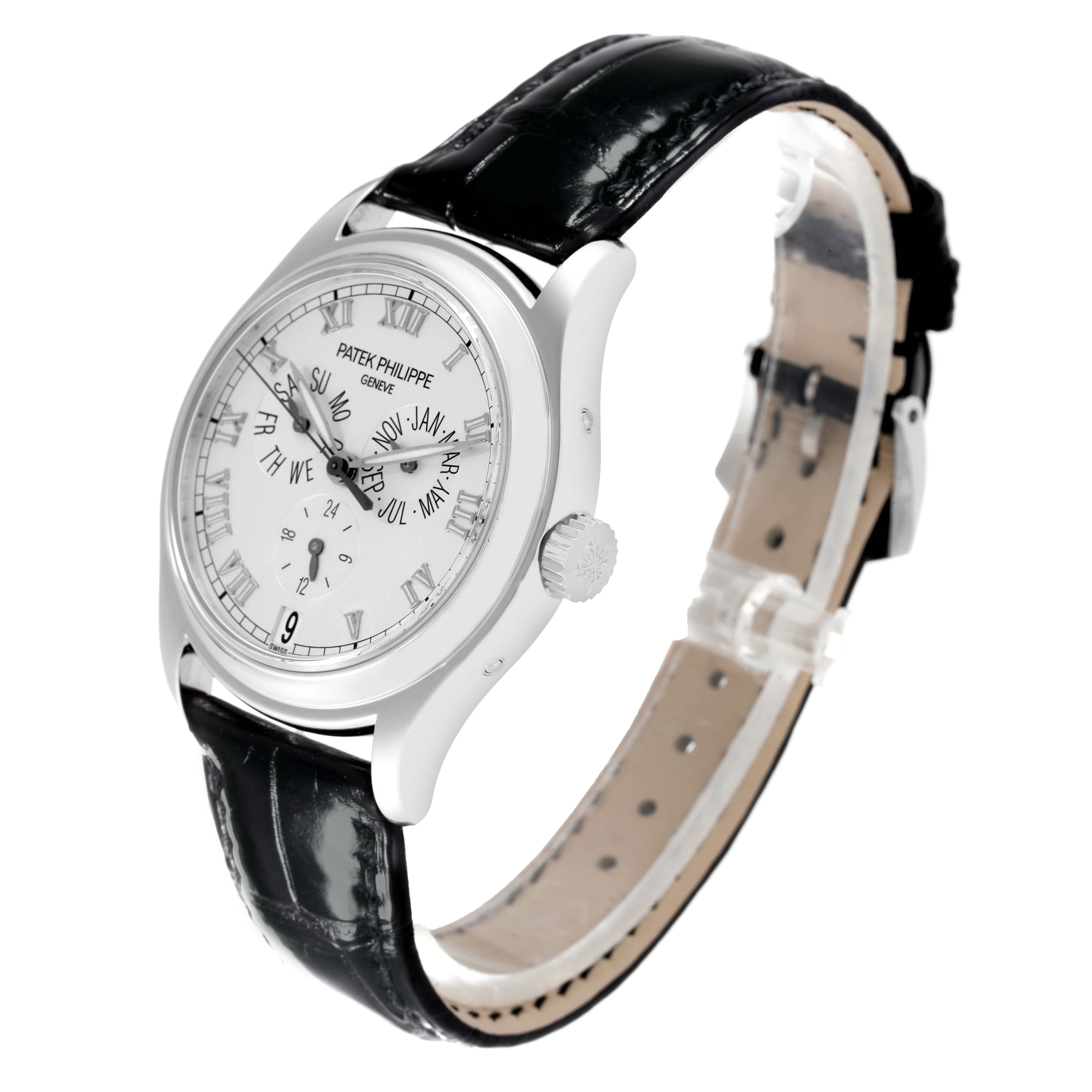 The image shows a side angle of the Patek Philippe Complications 5035P-026 Men's Platinum Silver Dial 5035P-026 Men's Platinum Silver Dial watch, highlighting the face, crown, and leather strap.