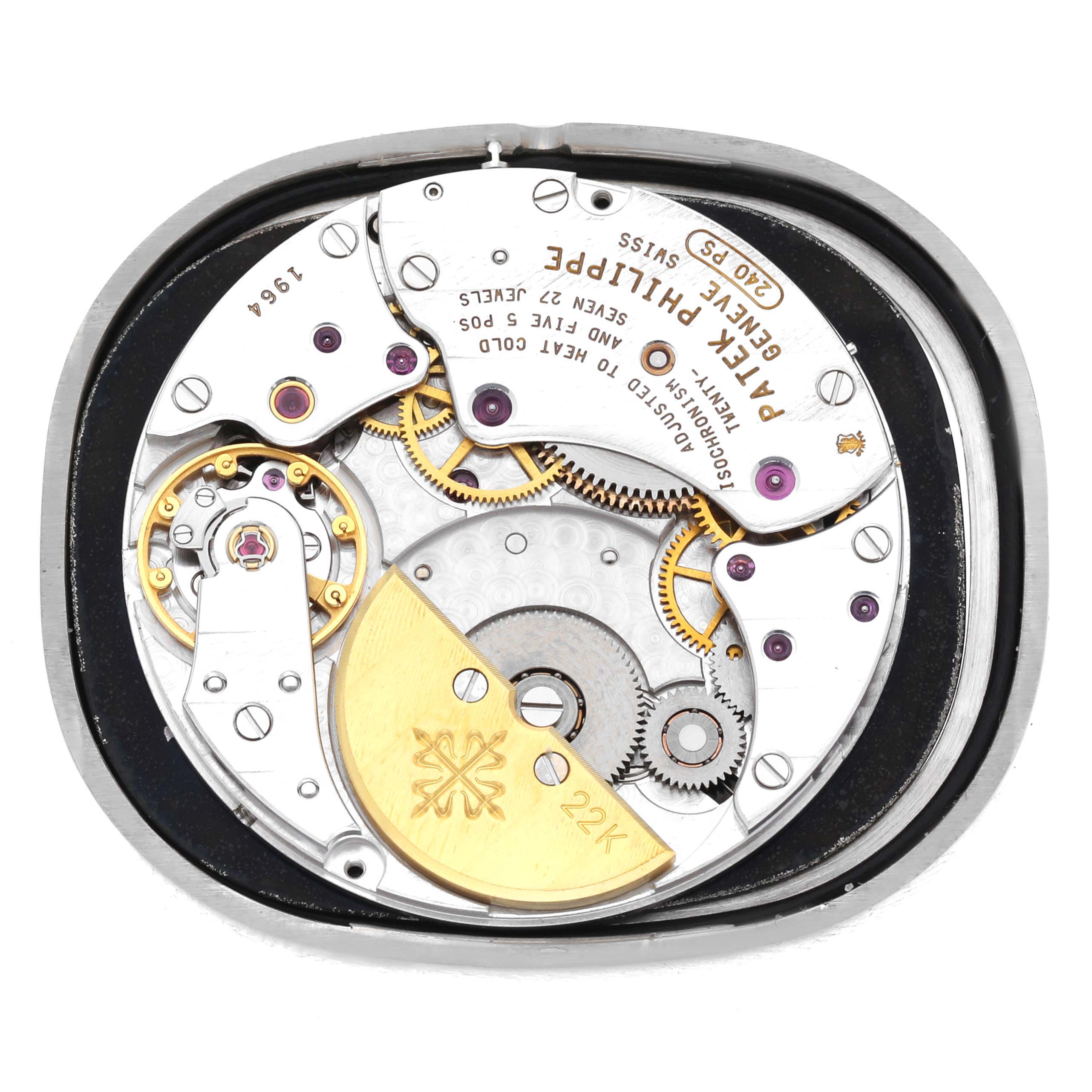 This is an internal view of the Patek Philippe Golden Ellipse 5028G Men's White Gold Black Dial 5028G Men's White Gold Black Dial watch, showcasing its intricate movement and gears.