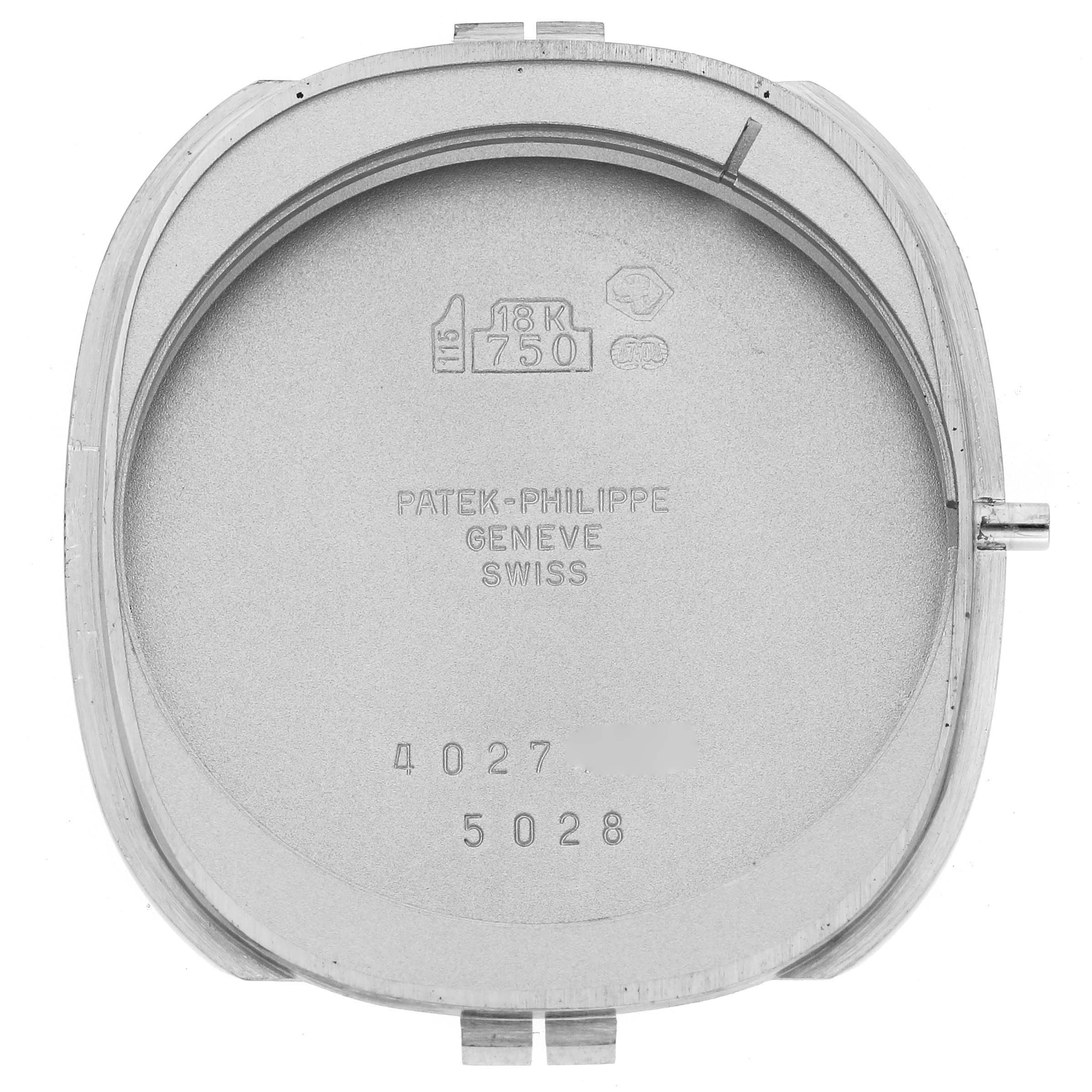 The image shows the back case of a Patek Philippe Golden Ellipse 5028G Men's White Gold Black Dial 5028G Men's White Gold Black Dial watch, displaying the engravings and case construction.