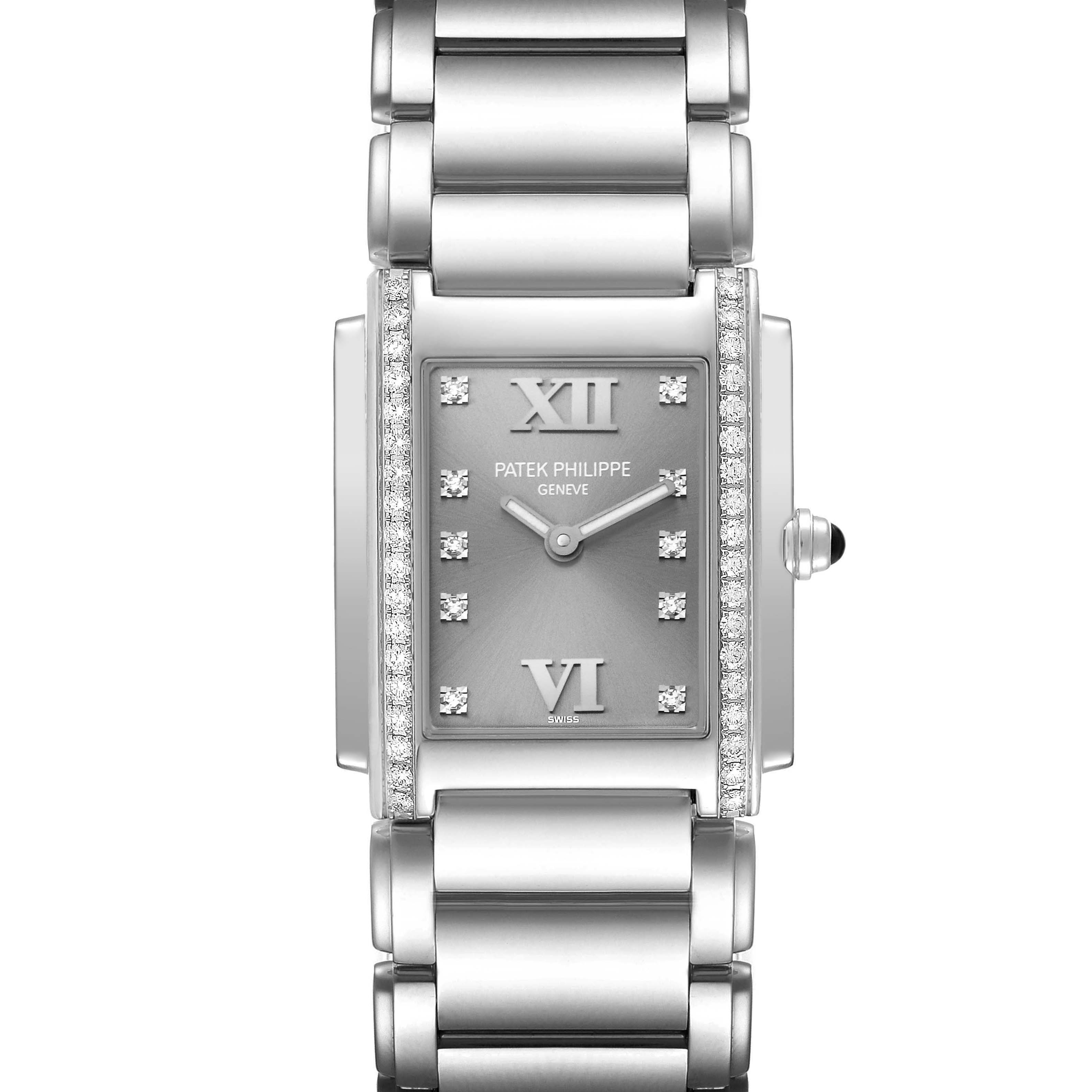 The image shows a front view of the Patek Philippe Twenty-4 4910/10 Women
s Stainless Steel Grey Dial 4910/10 Women
s Stainless Steel Grey Dial watch, highlighting the face, bracelet, and crown.