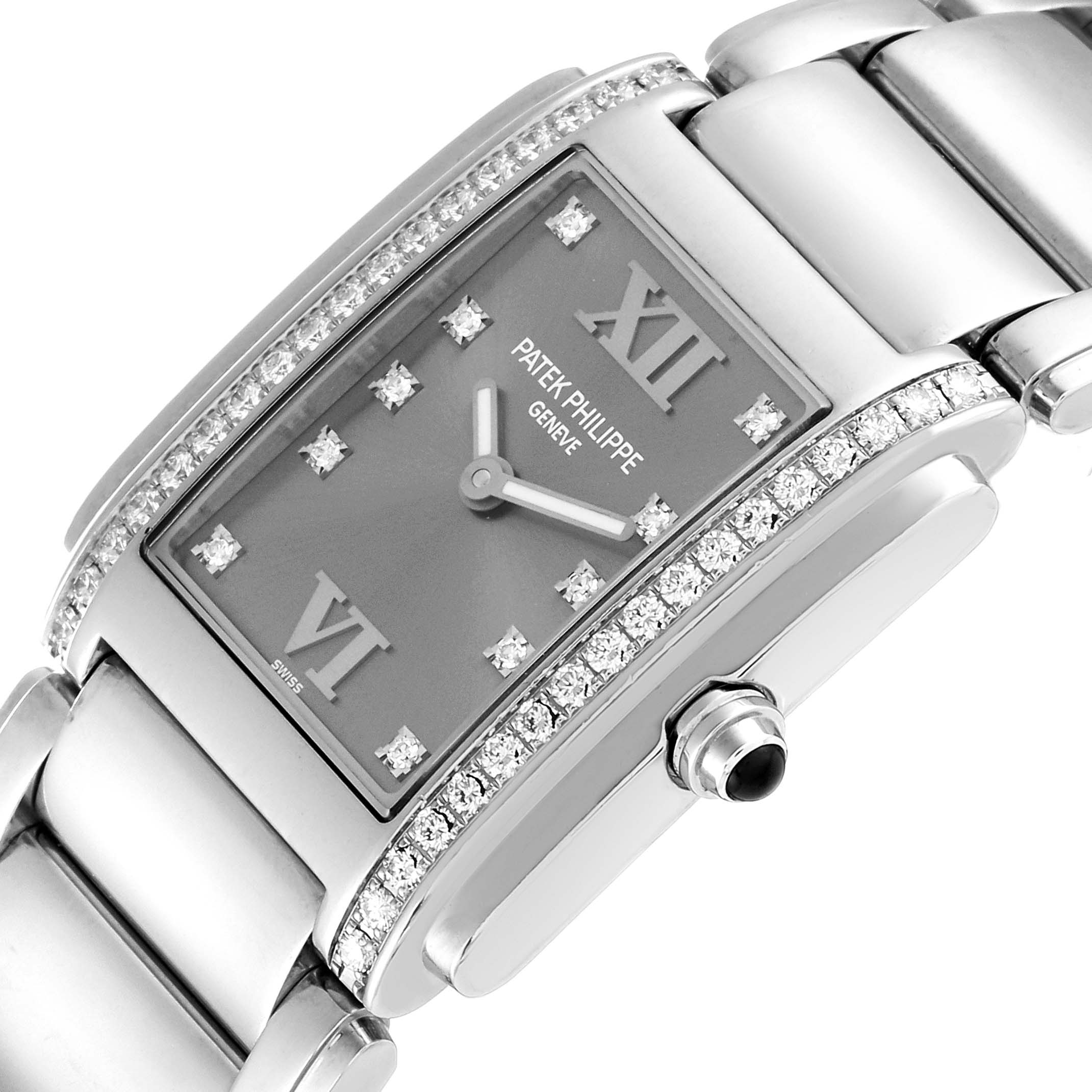 The image shows a close-up angled view of the dial, bezel, crown, and part of the bracelet of the Patek Philippe Twenty-4 4910/10 Women
s Stainless Steel Grey Dial 4910/10 Women
s Stainless Steel Grey Dial watch.
