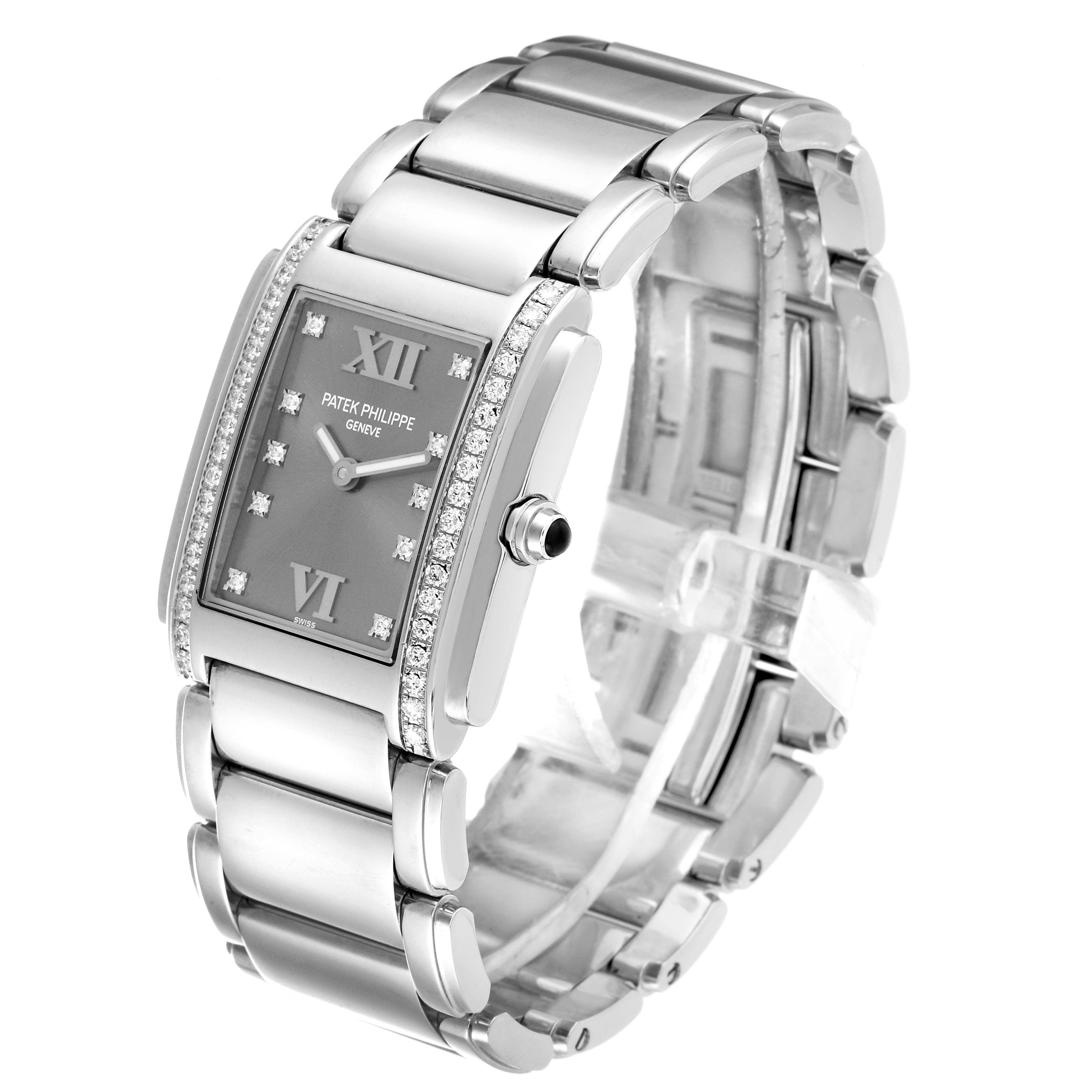 This image shows a Patek Philippe Twenty-4 4910/10 Women
s Stainless Steel Grey Dial 4910/10 Women
s Stainless Steel Grey Dial watch at a three-quarter angle, featuring the bracelet, dial, and bezel with diamond accents.