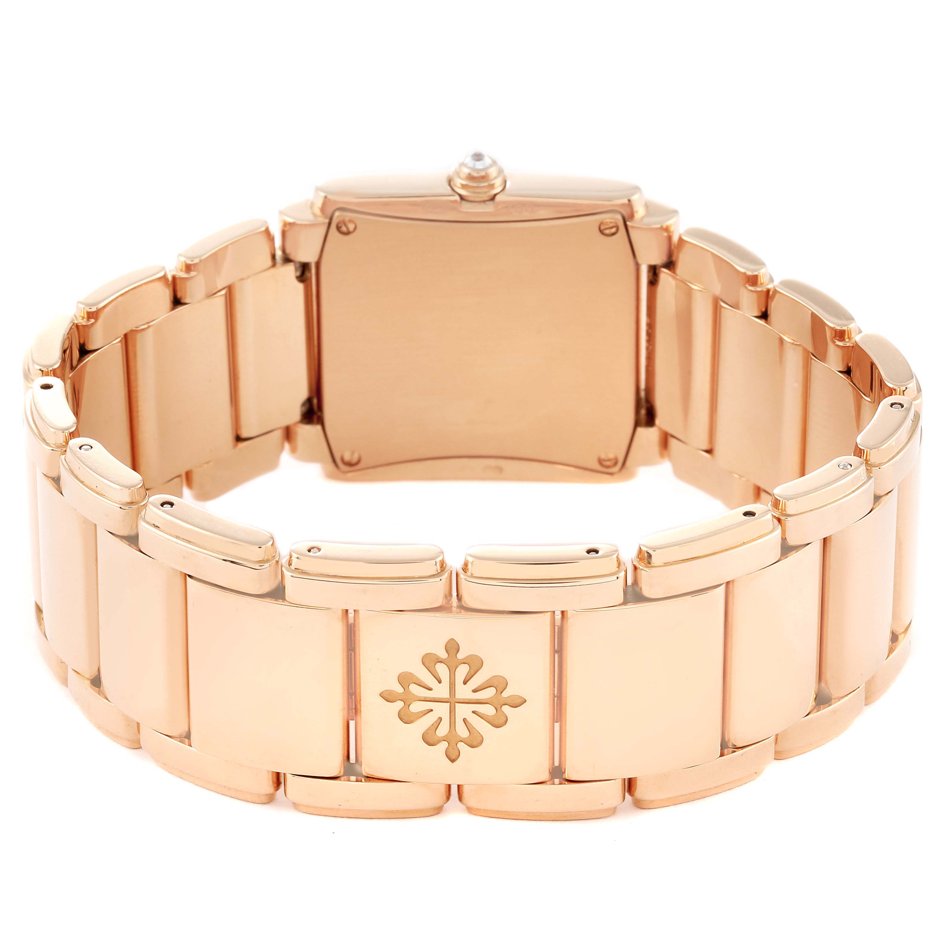 The image shows the back of the Patek Philippe Twenty-4 4910/11R Women's Rose Gold Brown Dial 4910/11R Women's Rose Gold Brown Dial model watch, focusing on its bracelet and case back.