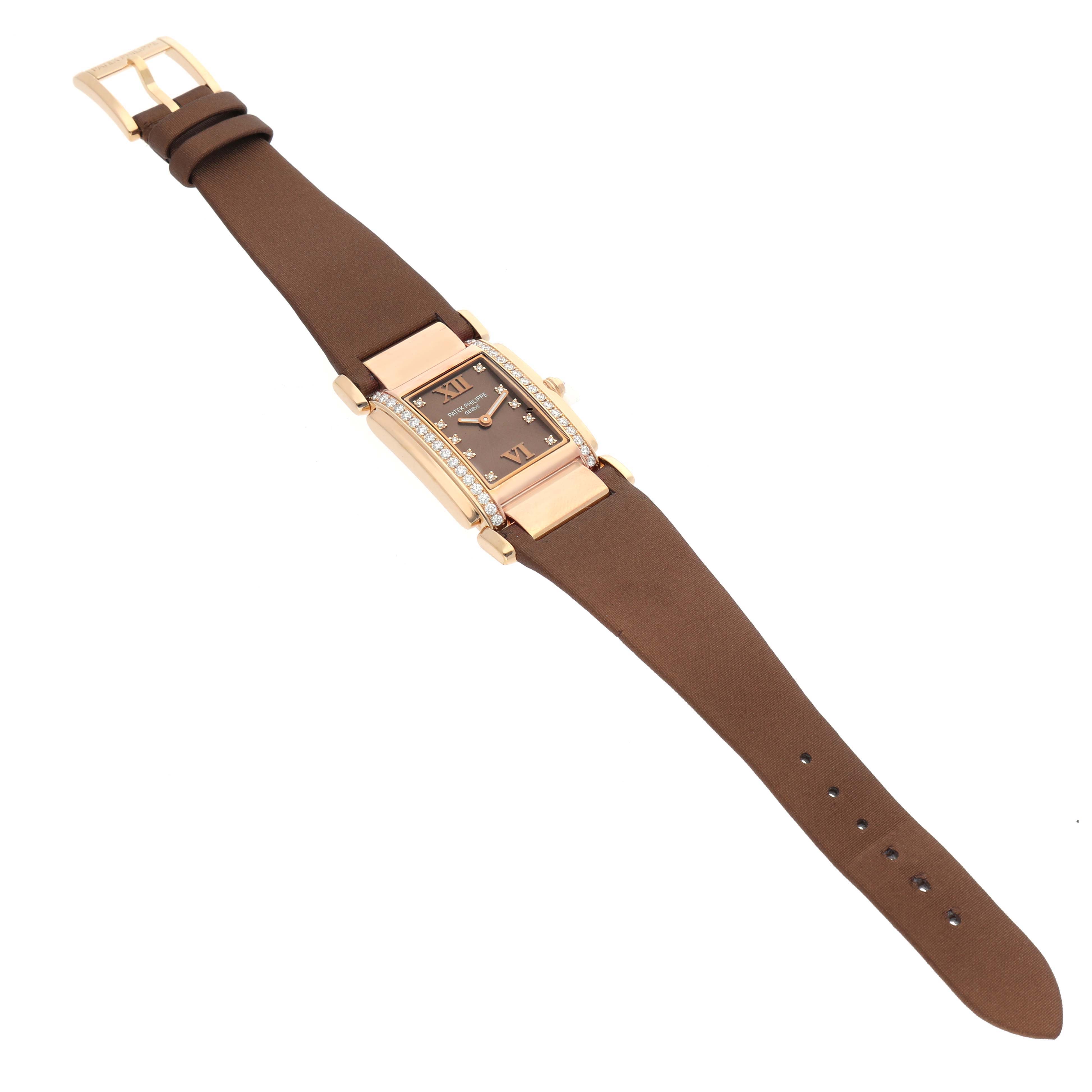 The Patek Philippe Twenty-4 4920R-001 Women's Rose Gold Brown Dial watch is viewed from above, showing its brown strap, rectangular face, and diamond-accented bezel.