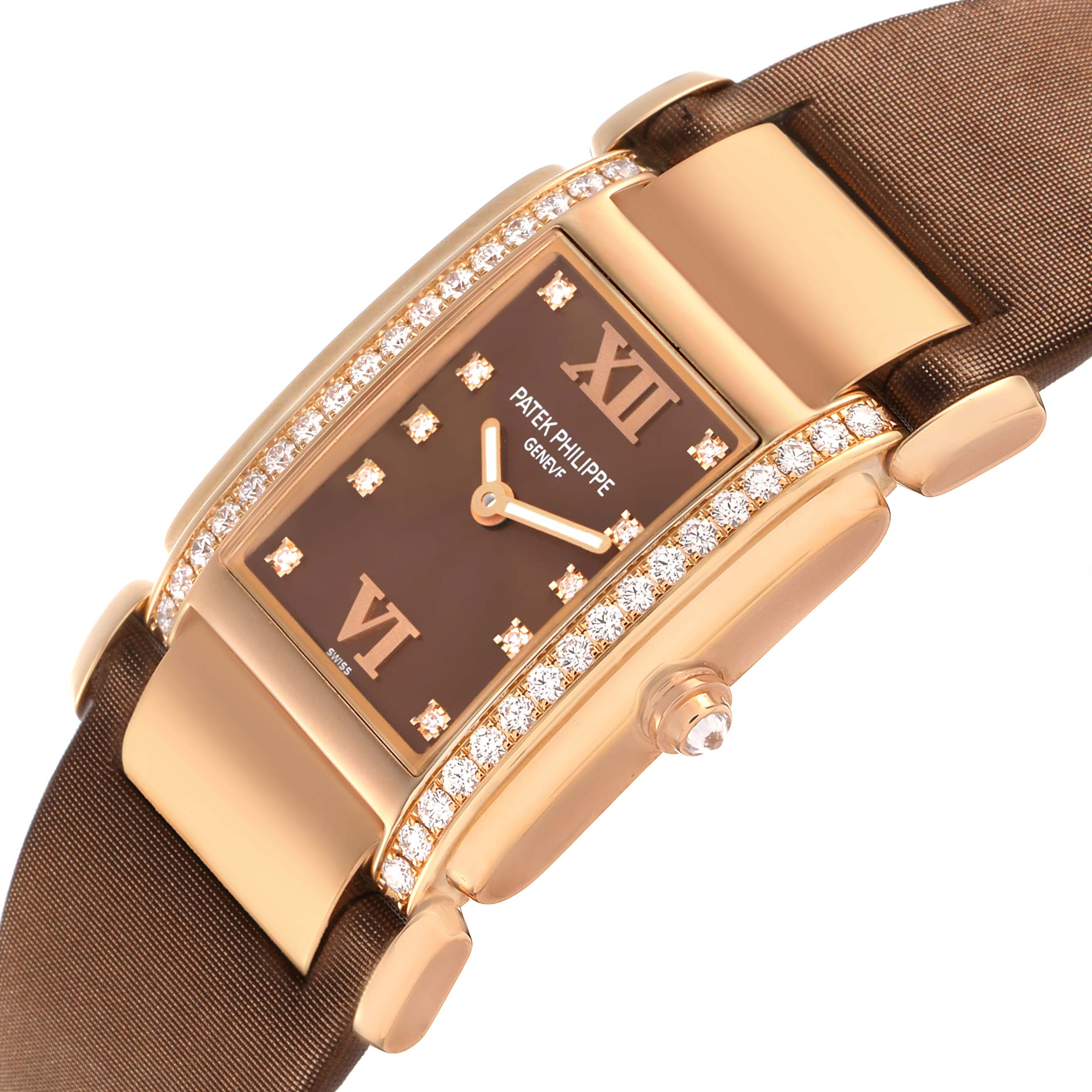 The Patek Philippe Twenty-4 4920R-001 Women's Rose Gold Brown Dial watch is shown at an angled view, highlighting the diamond-set case, dial, and brown strap.