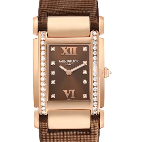 The Patek Philippe Twenty-4 4920R-001 Women's Rose Gold Brown Dial watch is shown from a front angle, highlighting its rectangular dial, diamond-set bezel, and brown strap.