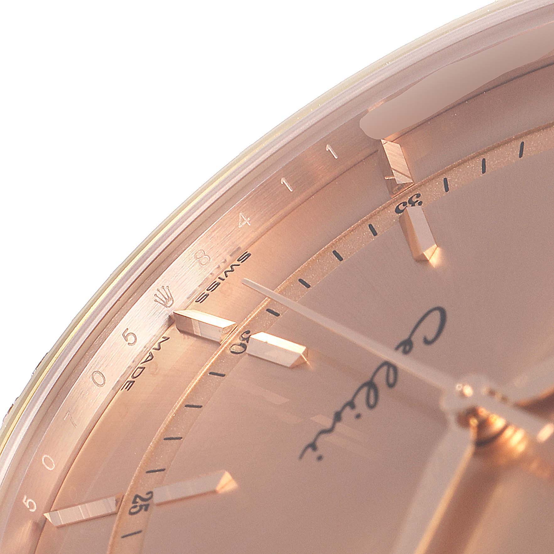 This image shows a close-up of the dial and hands of a Rolex Cellini 50705 Men
s Rose Gold Pink Dial 50705 Men
s Rose Gold Pink Dial watch.