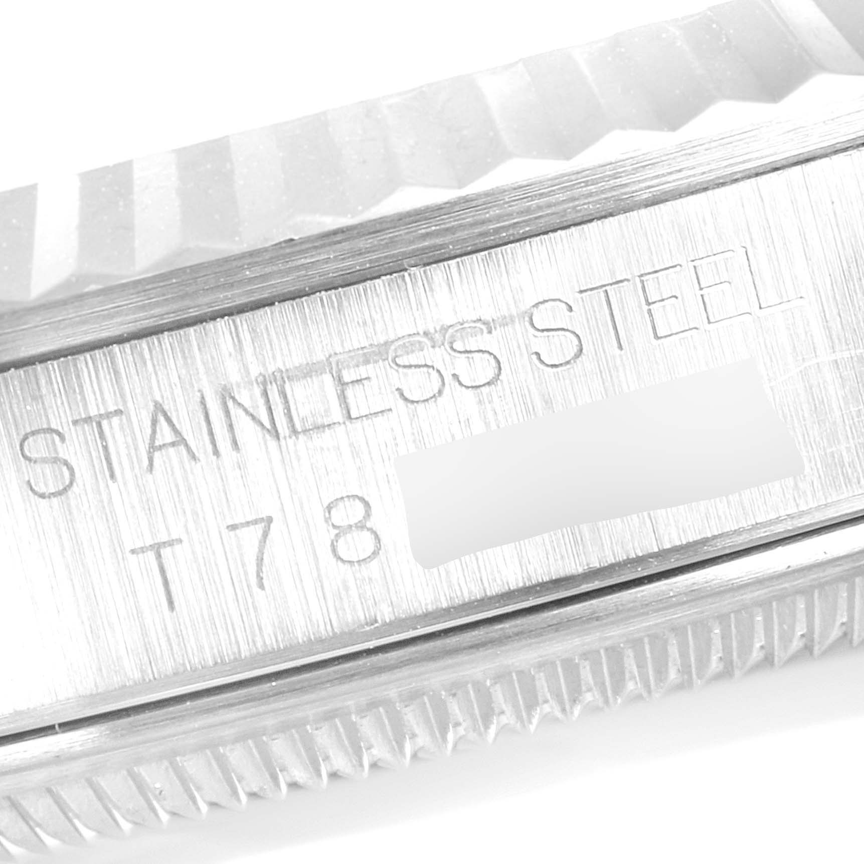 This image shows a close-up of the side view of the bezel and the steel casing with engravings on a Rolex Datejust 16234 Men
s Stainless Steel Mother of Pearl Dial 16234 Men
s Stainless Steel Mother of Pearl Dial watch.