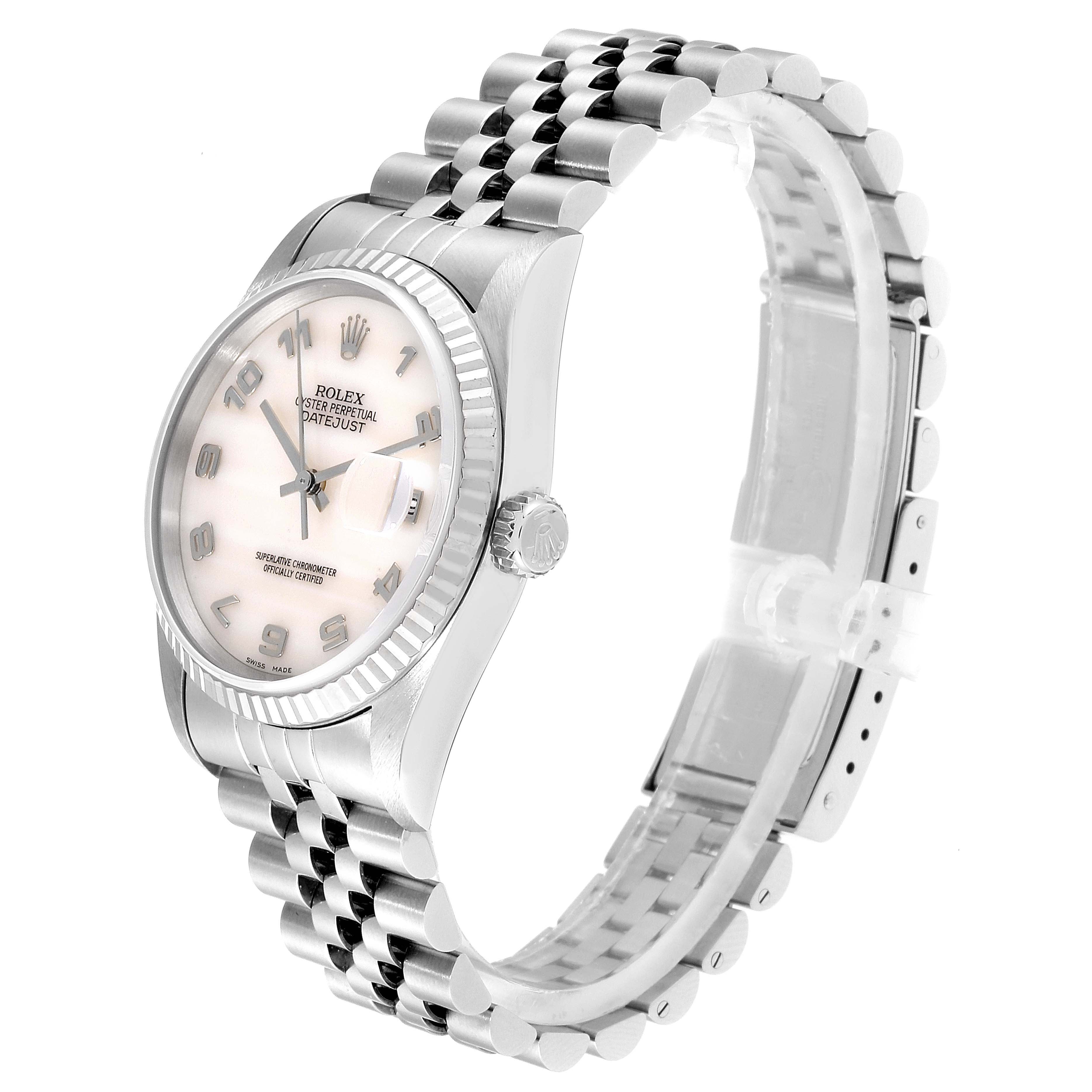 The Rolex Datejust 16234 Men
s Stainless Steel Mother of Pearl Dial 16234 Men
s Stainless Steel Mother of Pearl Dial watch is shown at a side angle displaying its face, crown, and jubilee bracelet.