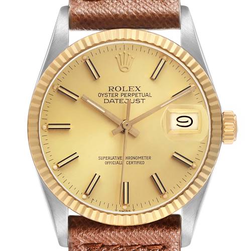 The Rolex Datejust 16013 Men's Steel and Gold (two tone) Champagne Dial watch is shown from a front angle, highlighting the dial, fluted bezel, and brown leather strap.