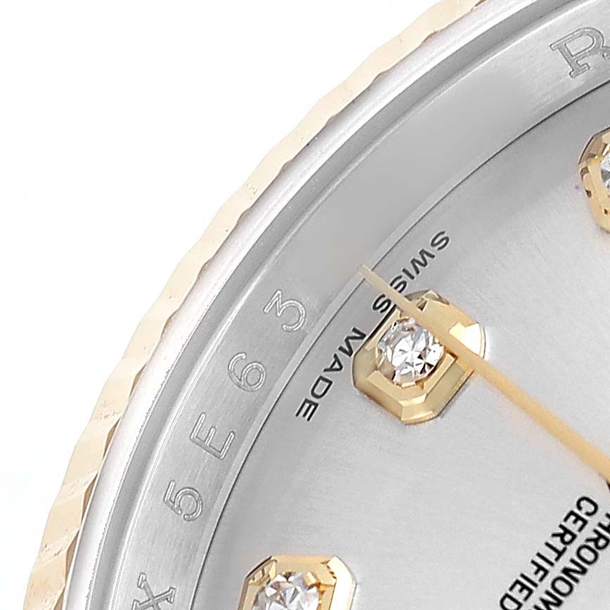The image shows a close-up of a Rolex Datejust 116233 Men's Steel and Gold (two tone) Silver Dial watch face, featuring diamond markers, part of the bezel, and the Swiss Made label.