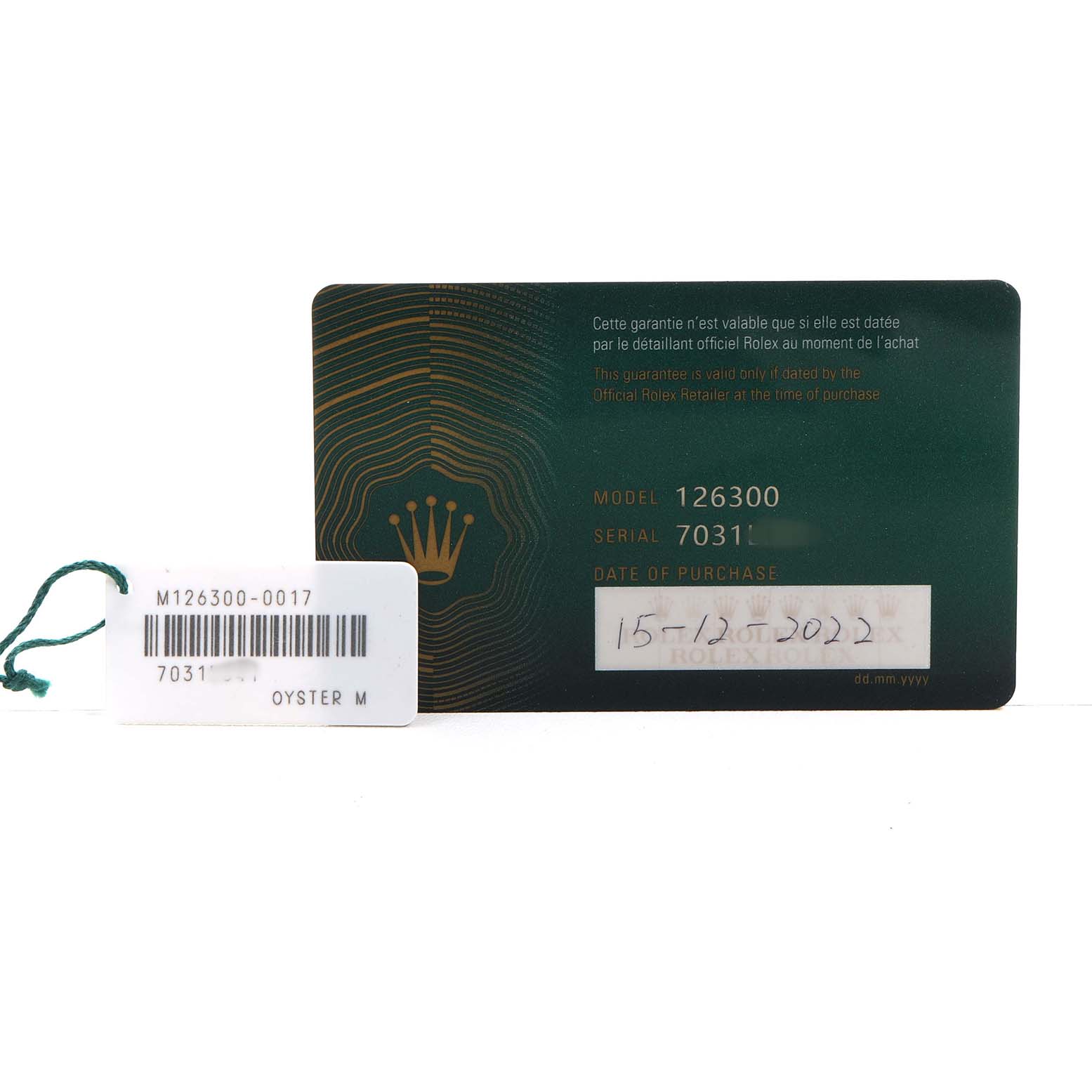 The image shows a Rolex Datejust 126300 Men's Stainless Steel Blue Dial warranty card and a tag with model details, including model and serial numbers.