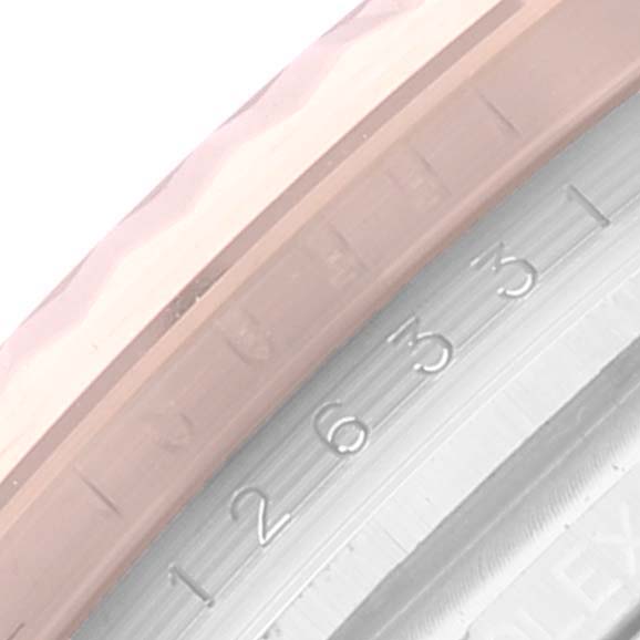 The image shows a close-up of the bezel and numeric engraving on a Rolex Datejust 41 126331 Men's Steel and Gold (two tone) Brown Dial 126331 Men's Steel and Gold (two tone) Brown Dial model watch.