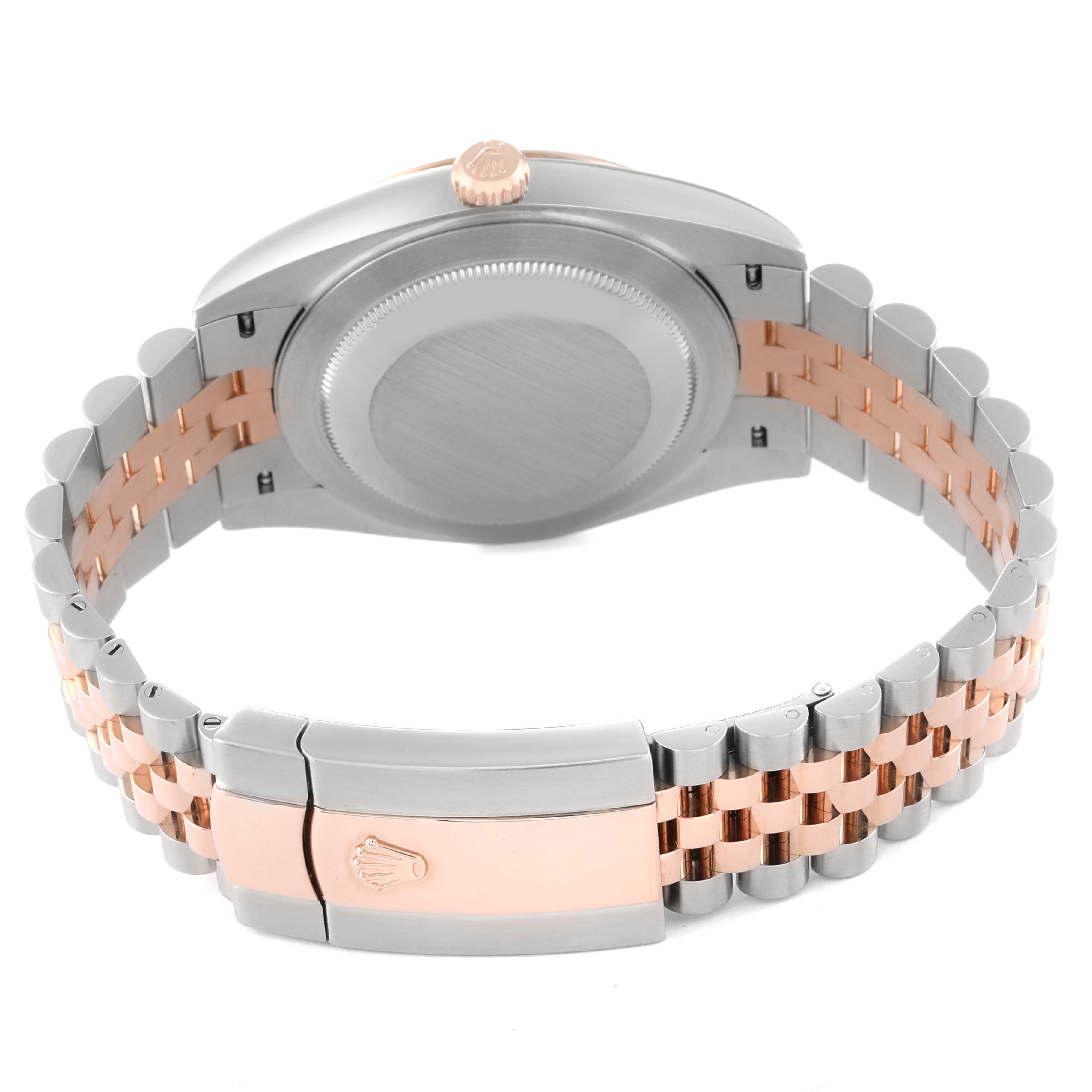 This image shows the back case and clasp of a Rolex Datejust 41 126331 Men's Steel and Gold (two tone) Brown Dial 126331 Men's Steel and Gold (two tone) Brown Dial watch, highlighting the two-tone metal bracelet.