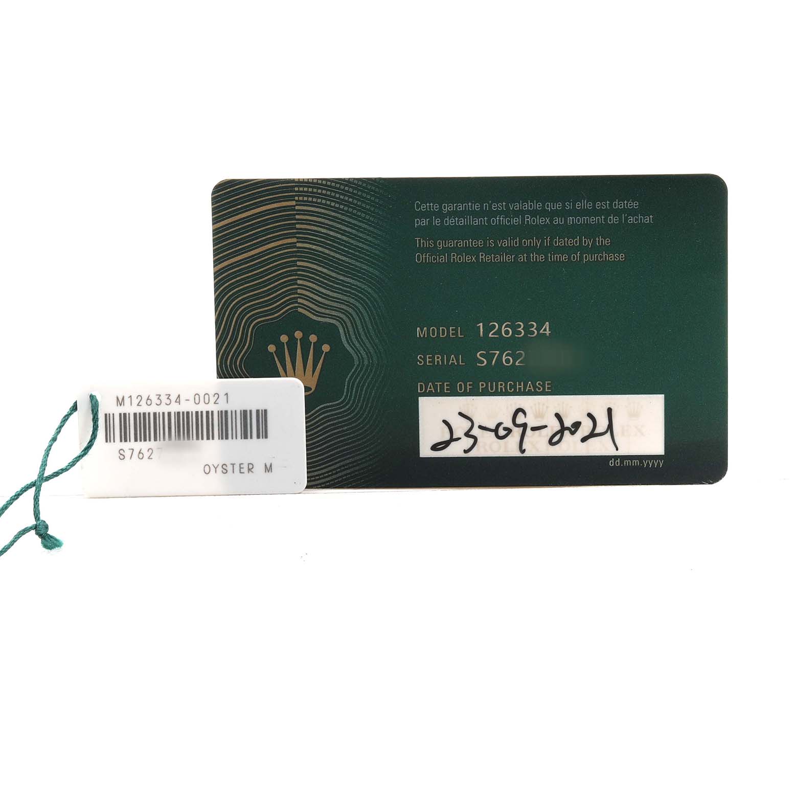 The image shows a warranty card and tag for a Rolex Datejust 41 126334 Men's Stainless Steel Grey Dial, with model and serial numbers visible.