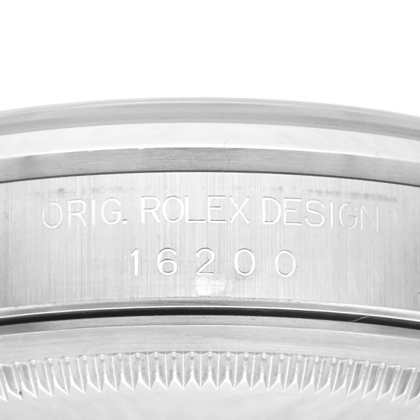 This image shows the side view of the case with the engraving "ORIG. ROLEX DESIGN 16200" on a Rolex Datejust 16200 Men's Stainless Steel Blue Dial 16200 Men's Stainless Steel Blue Dial watch.